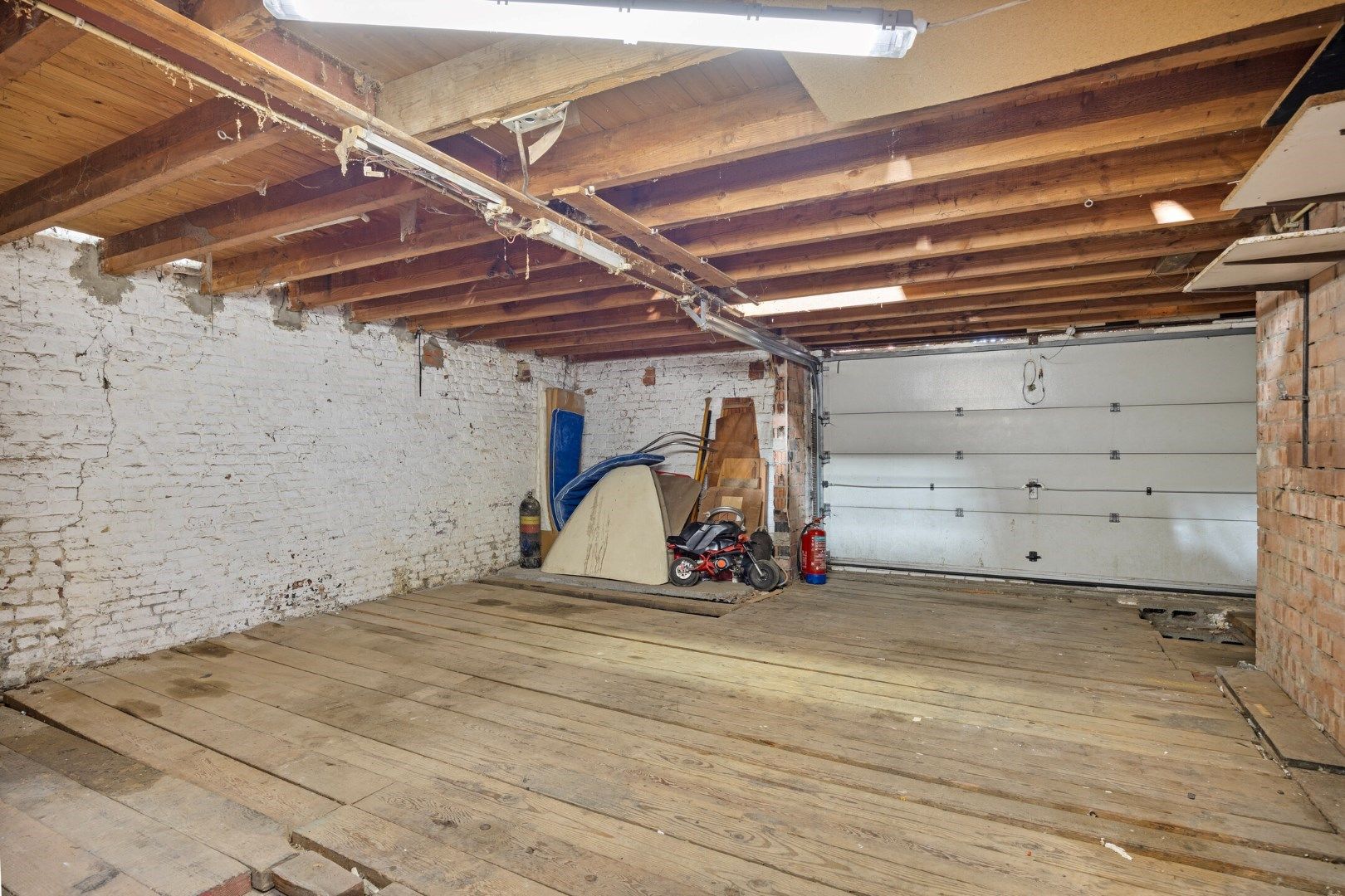 Halfopen hoekwoning met garage en dakterras op toplocatie in Kessel-Lo – renovatieproject met veel potentieel foto 15
