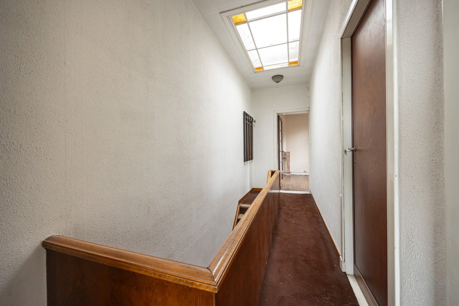 Te renoveren opbrengsteigendom met 3 éénslaapkamerappartementen nabij het Boekenbergpark foto 15