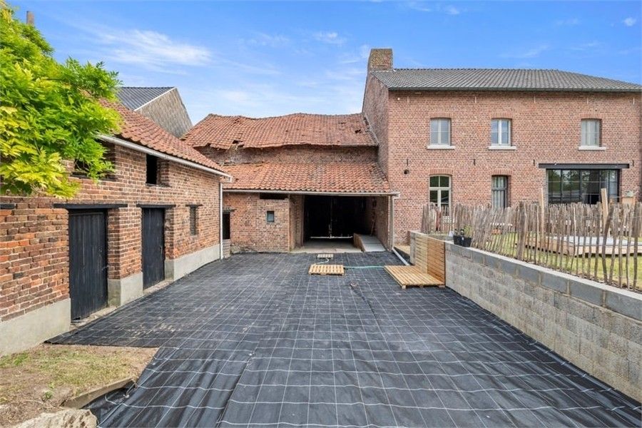 AUTHENTIEKE WONING MET RUIME SCHUUR EN VEEL POTENTIEEL IN TONGEREN foto 9