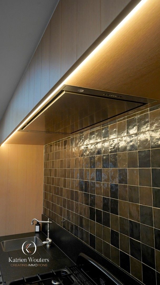 Gunstig gelegen gerenoveerde gezinswoning met tuin foto 9