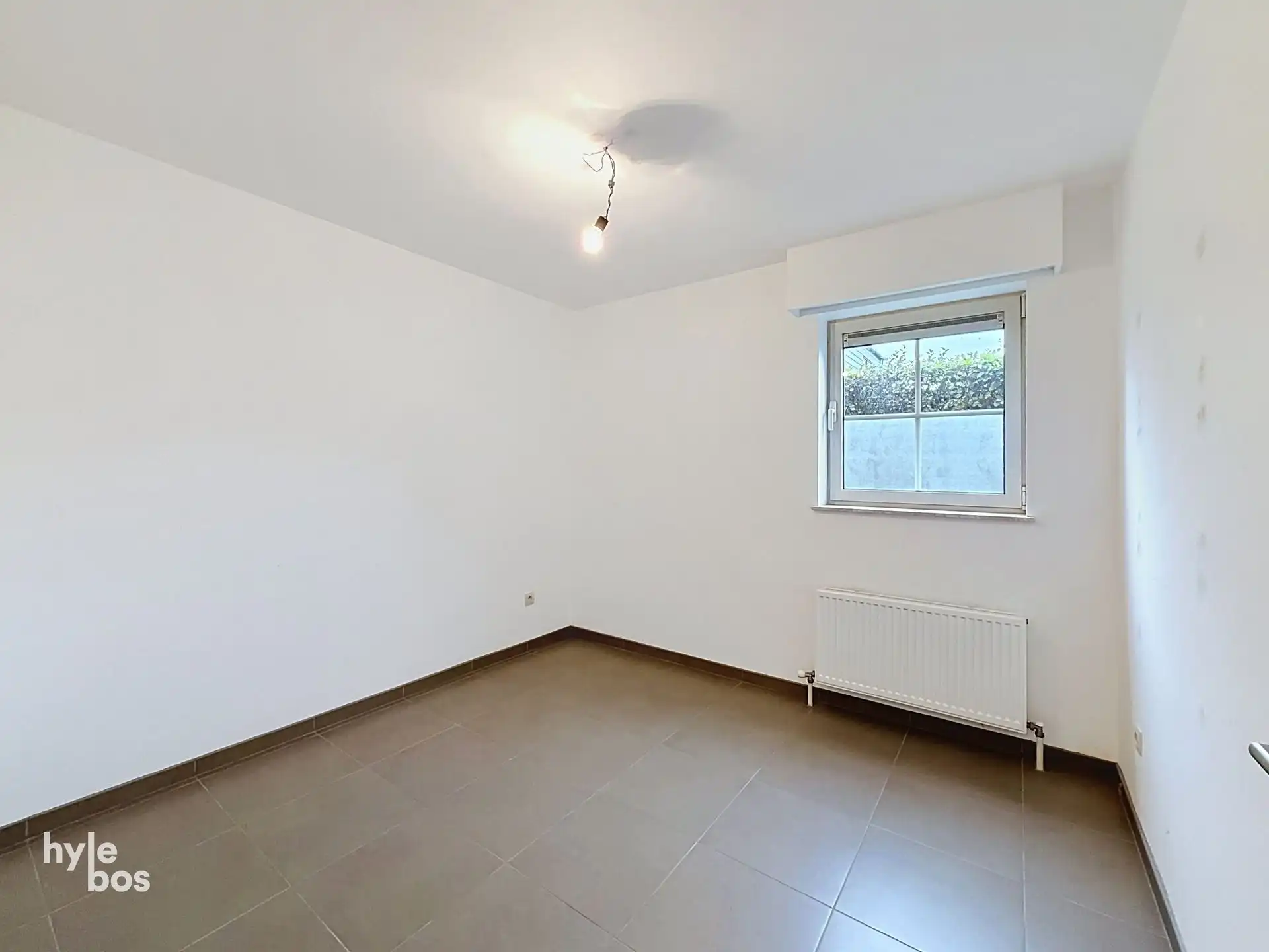 Aan de stadsrand gelegen gelijkvloers appartement foto 10