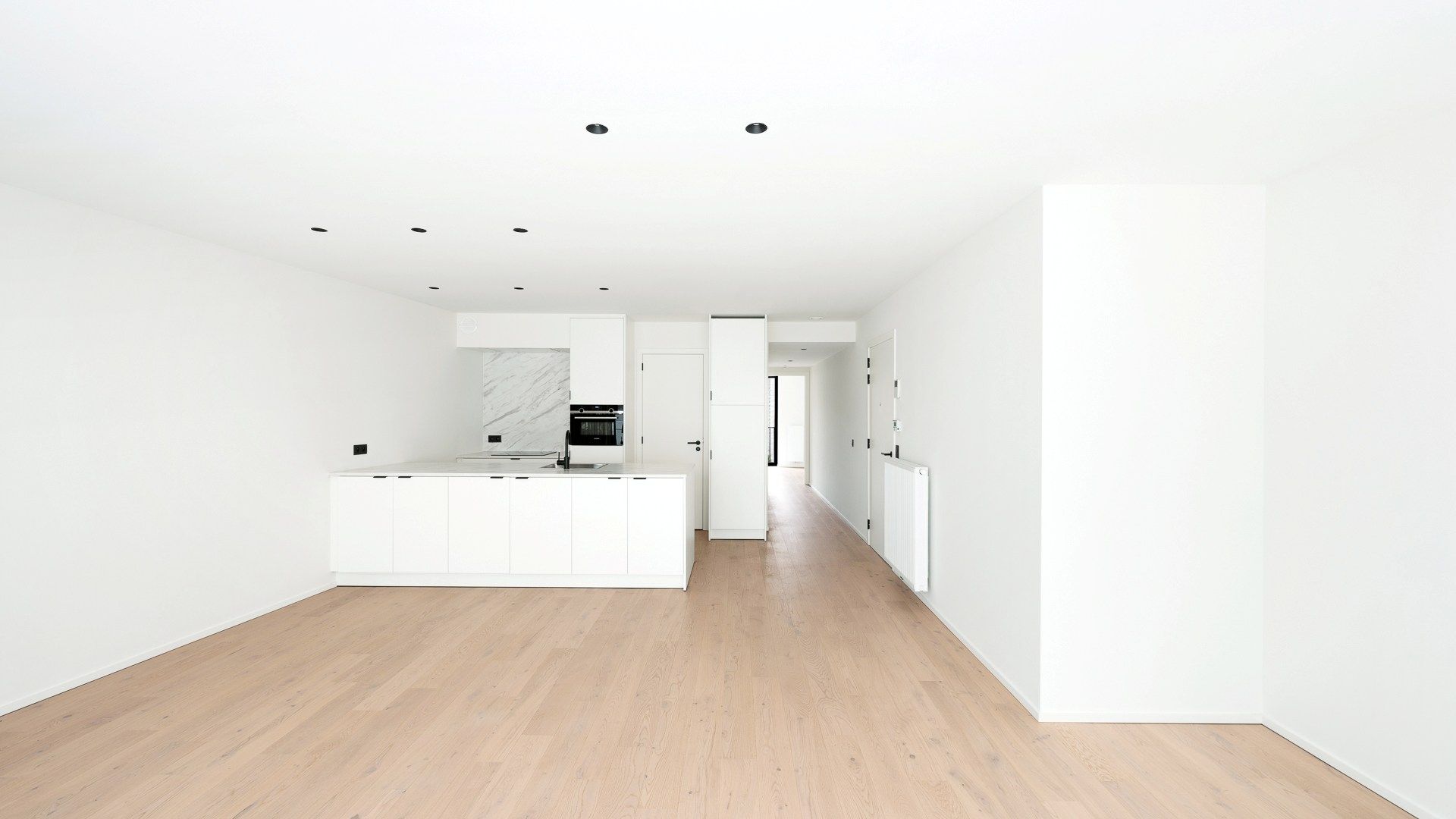 Nieuw appartement met 2 slaapkamers centraal gelegen te Heist foto {{pictureIndex}}