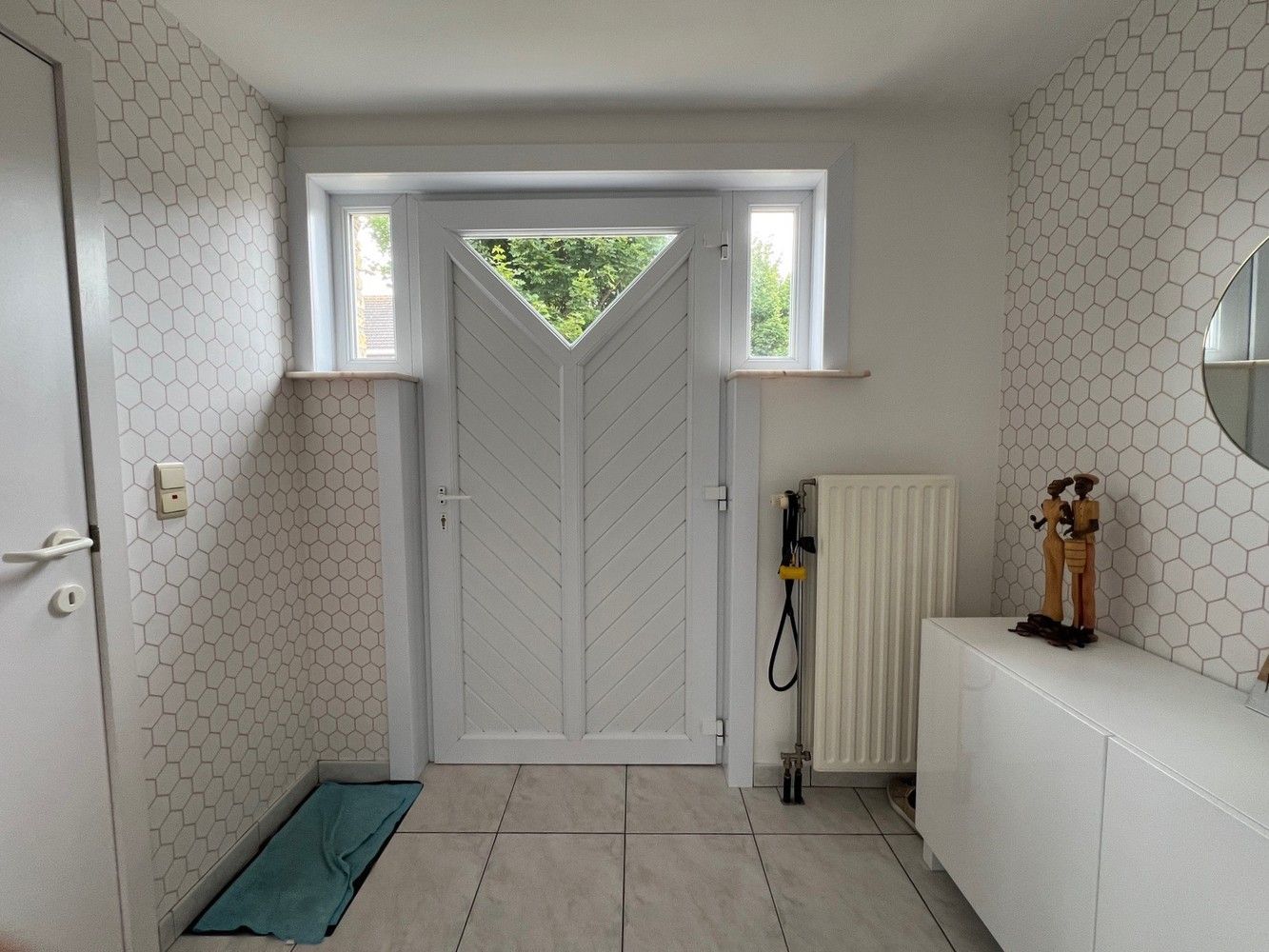 Instapklare woning met 3 slaapkamers en garage foto 2