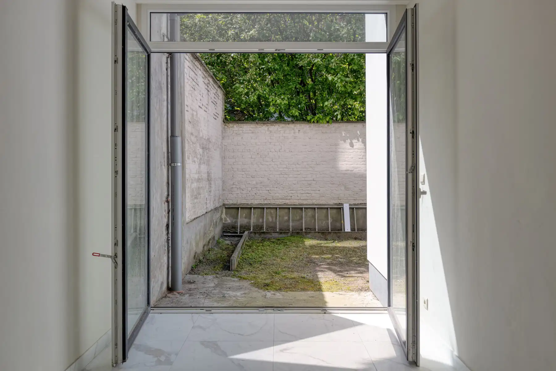 Gelijkvloers appartement met tuin. foto 6
