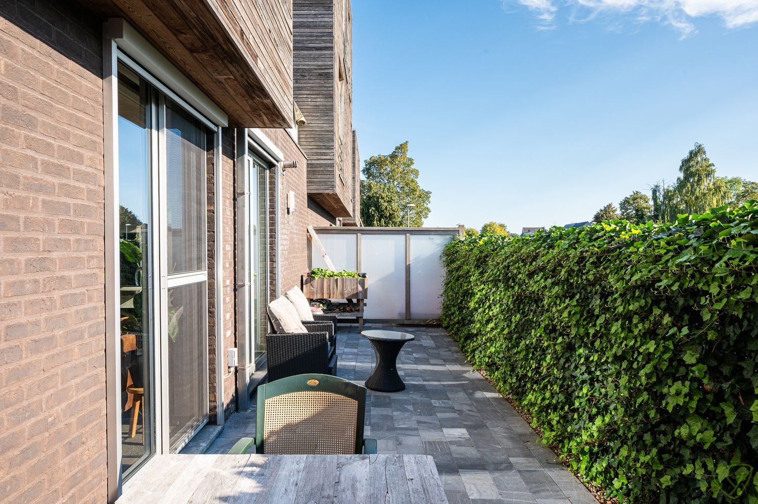 Instapklare woning met zonnige terrassen en garagebox foto 20