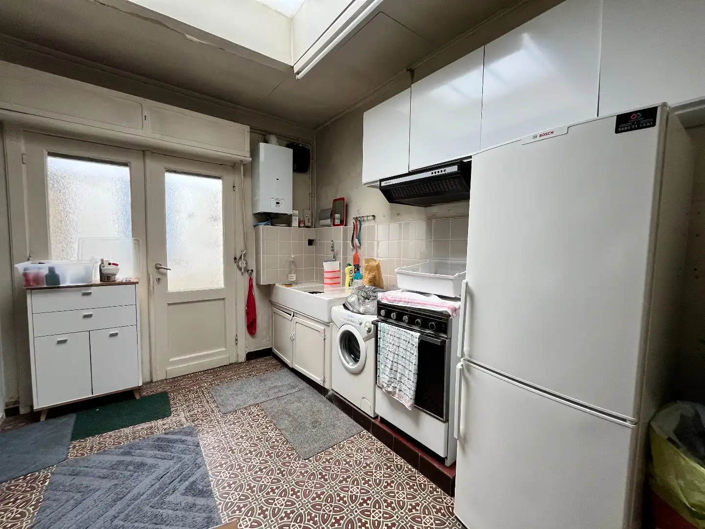 Te renoveren stadswoning met 4 slpk, koer en garage foto 12