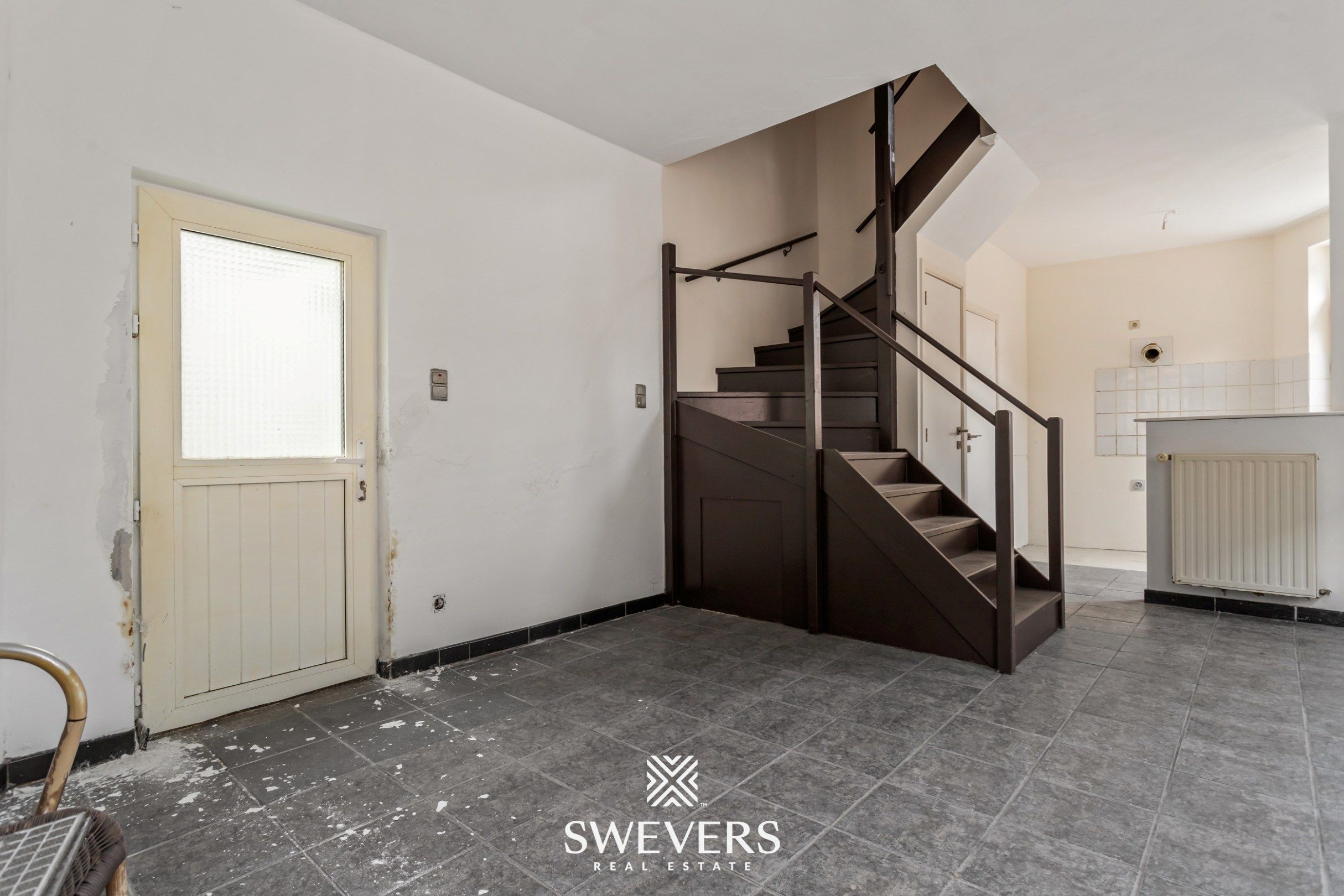 Charmante hoekwoning met potentieel in hartje Tongeren foto 4