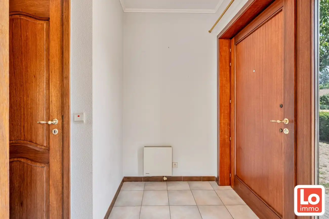 Gelijkvloerse open woning met dubbele inpandige garage en zonnige tuin op een toplocatie nabij het centrum van Lochristi! foto 4