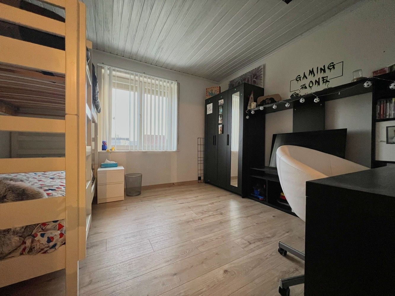 Ruime, lichtrijke woning met zonnige tuin+ aparte garage foto 8