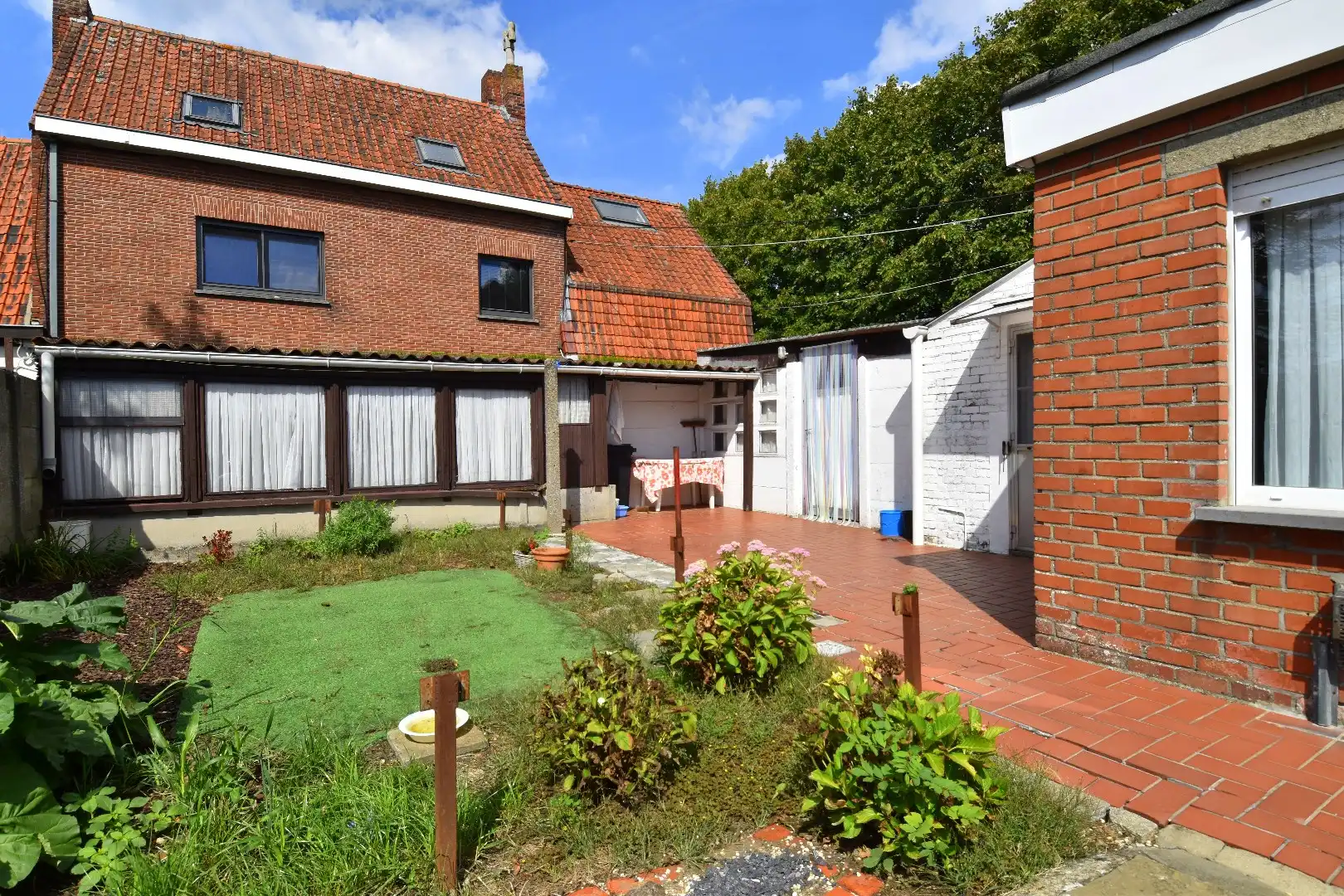 Woning met veel potentieel, garage en charmante tuin te koop in Kuurne foto 10