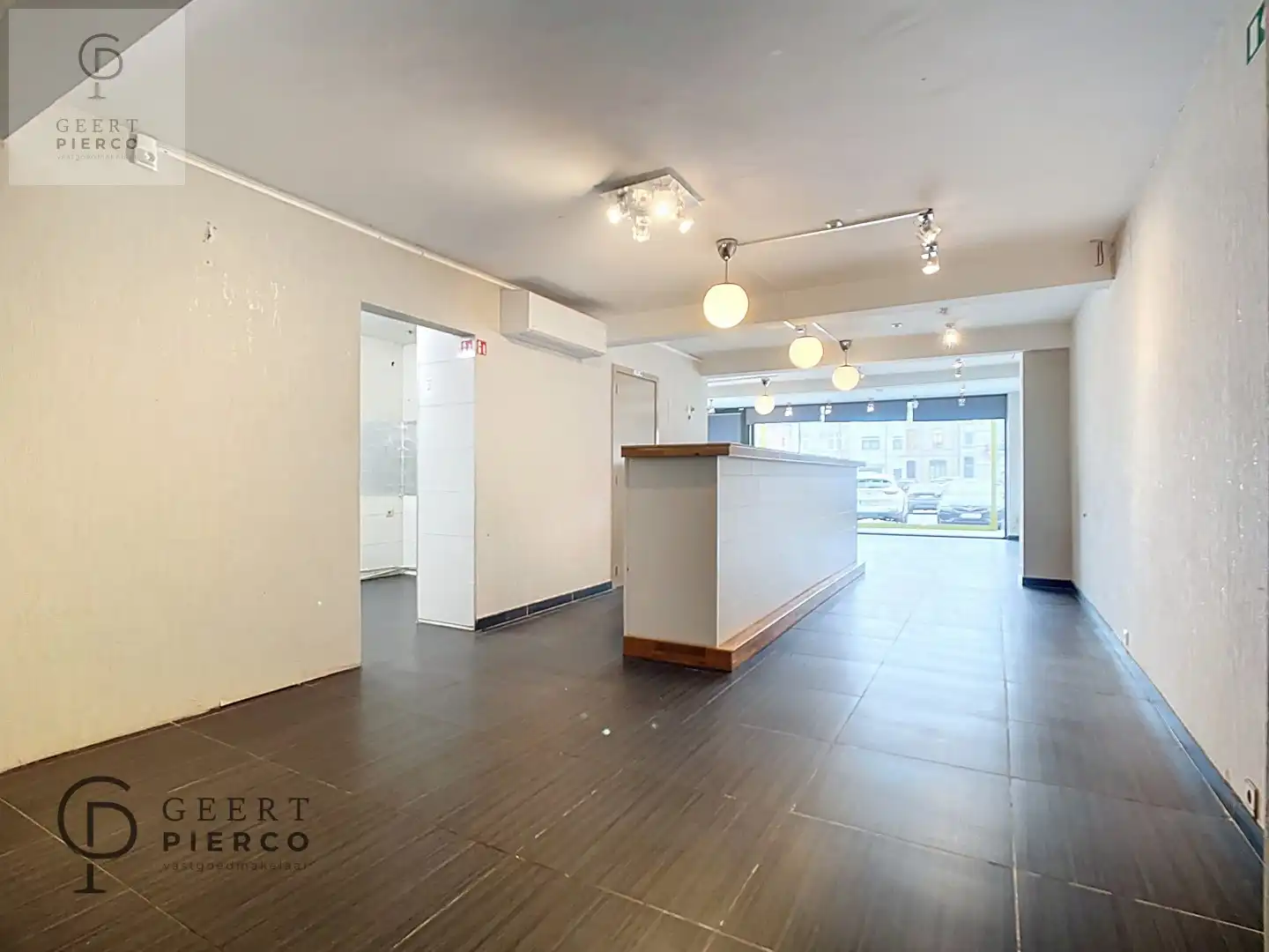 Handelszaak met woonst foto 7