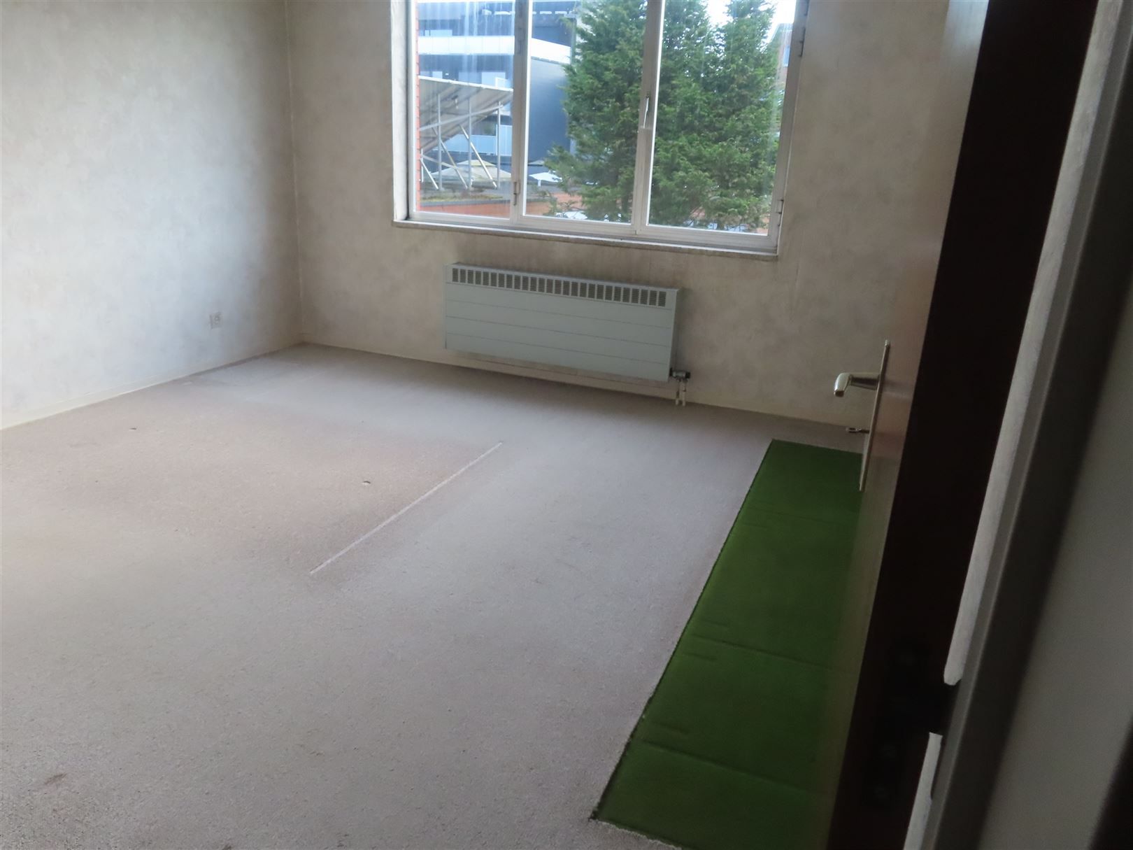 Opbrengsteigendom met 3 appartementen (94m²) & 3 garageboxen foto 16