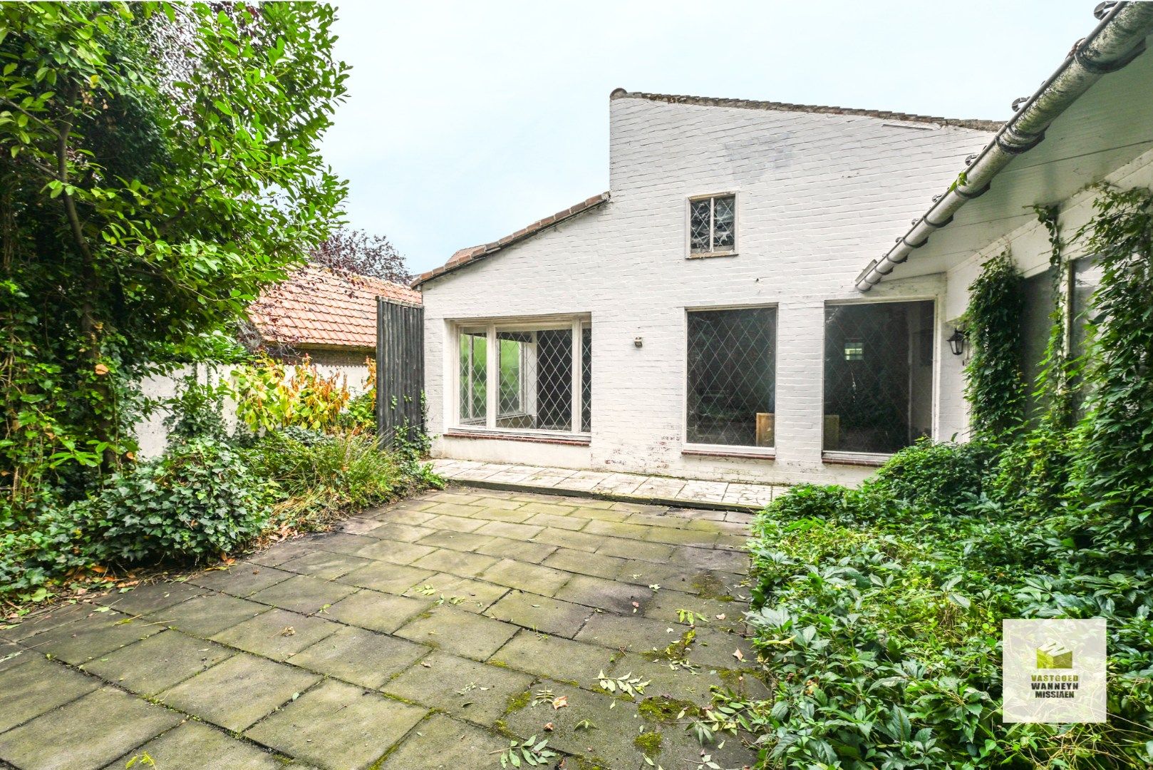Karaktervolle, te renoveren woning met 3 slaapkamers, diepe tuin, garage met uitweg foto 16