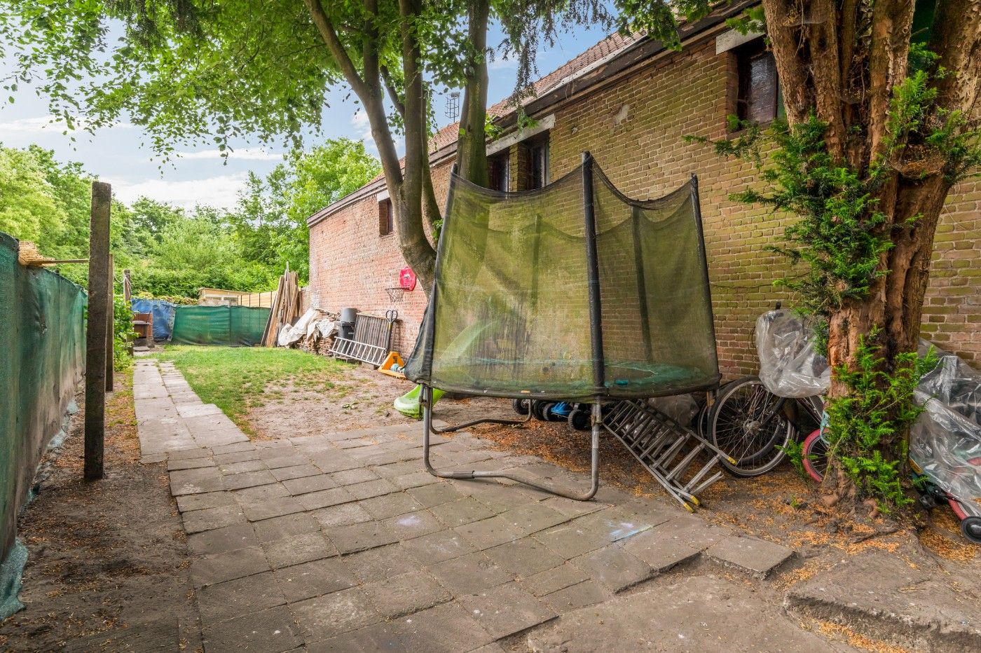 Te renoveren woning met 3 slpk. en tuin foto 20