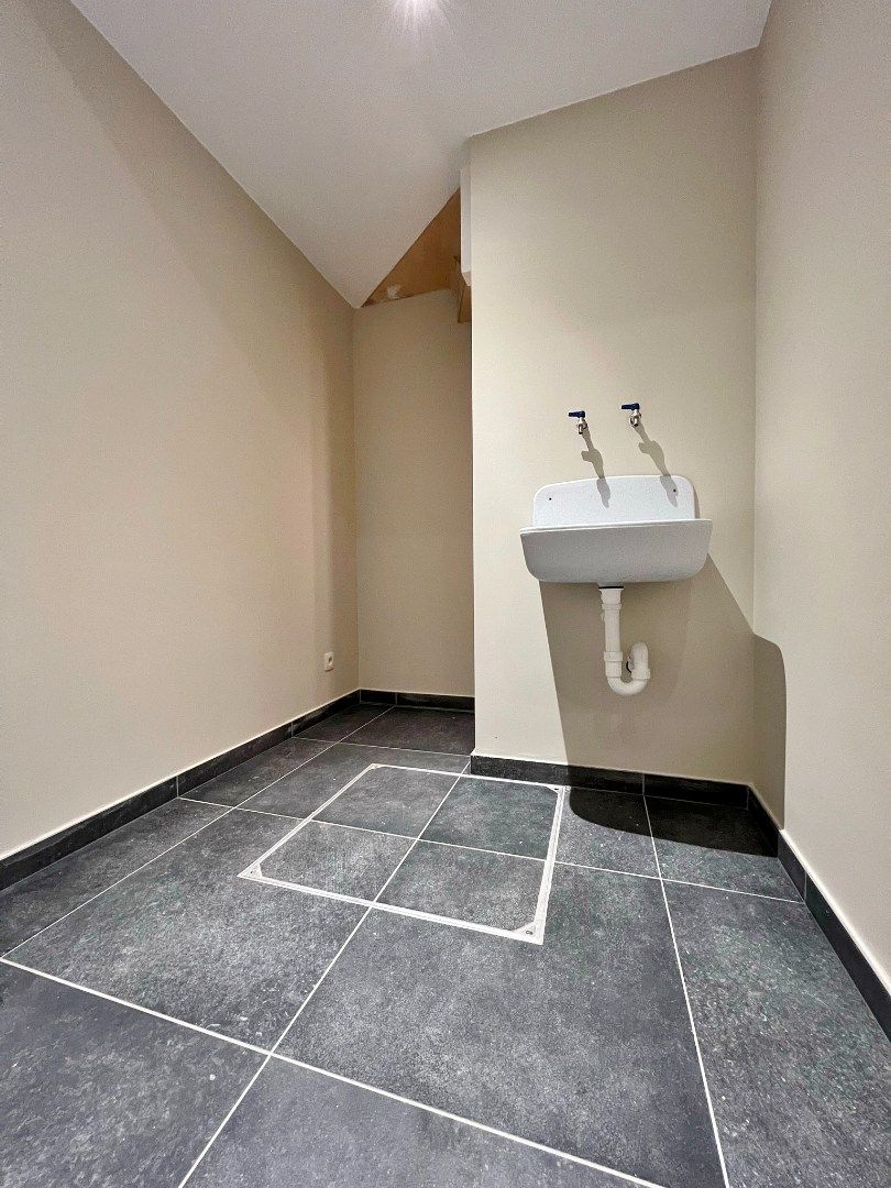 Volledig vernieuwde rijwoning met zonnige tuin en 3 slaapkamers.  foto 7