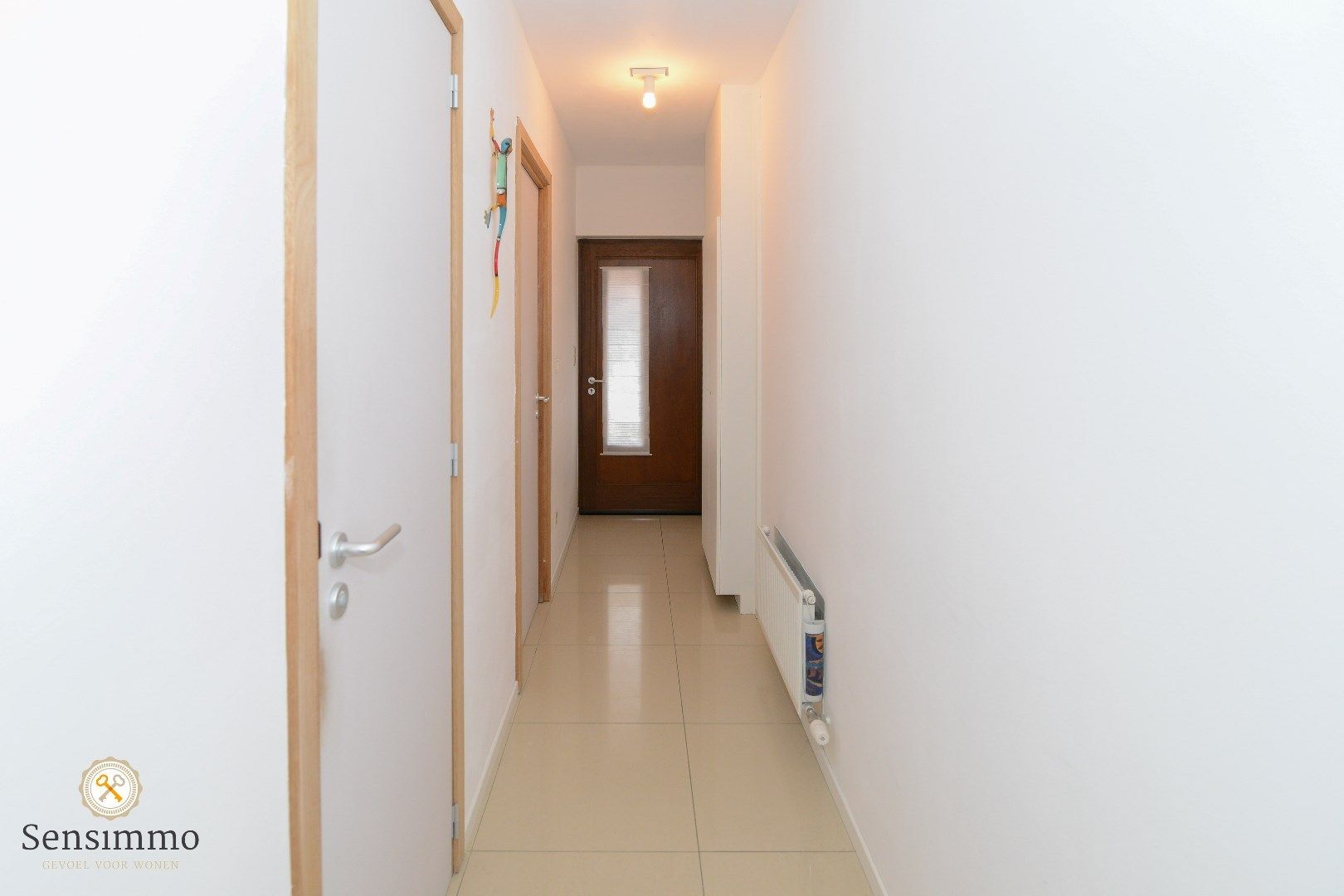 Gelijkvloers éénslaapkamerappartement met terras en parking foto 12