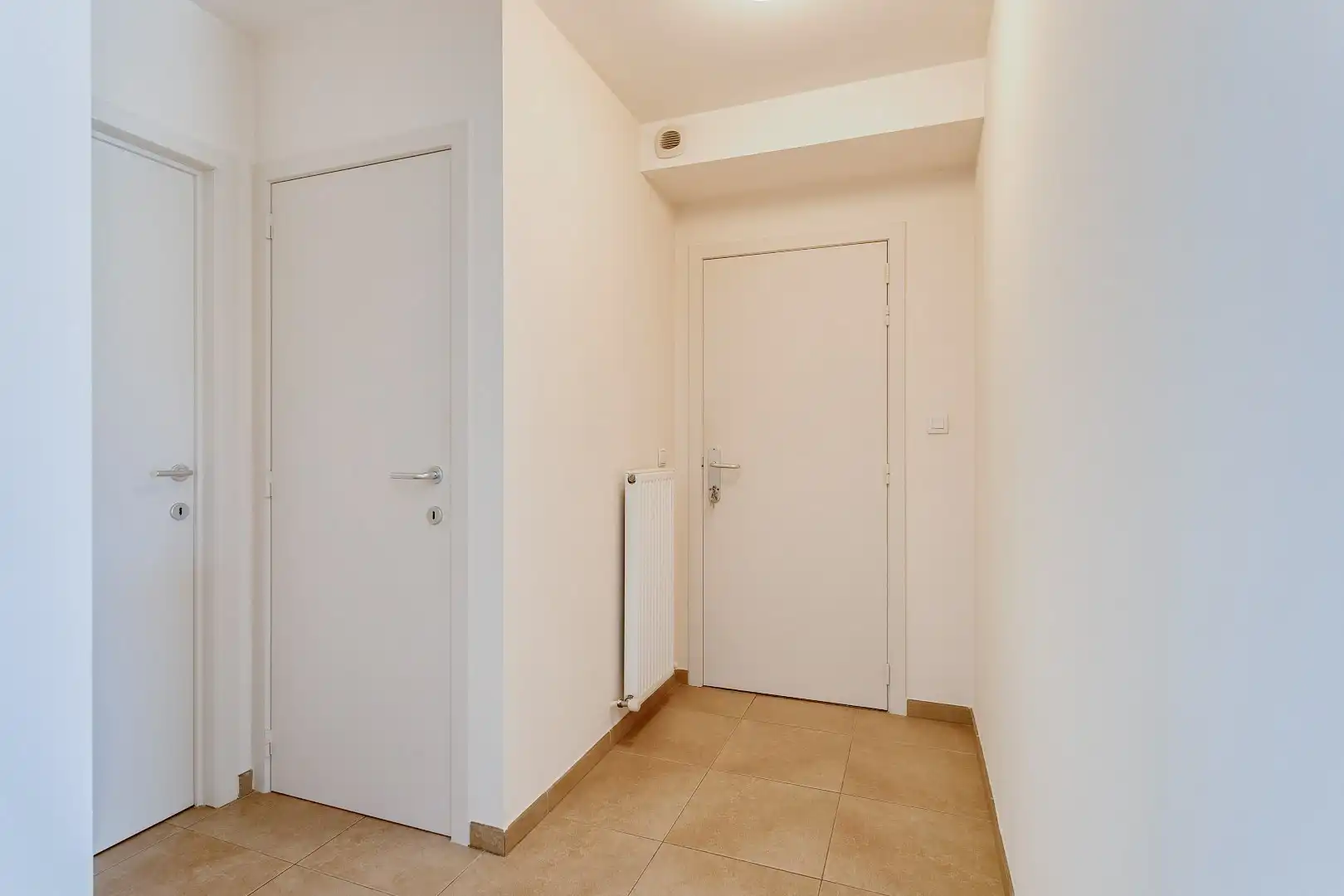 Modern, gelijkvloers appartement met 2 slpk, ondergrondse parking en tuin. foto 14