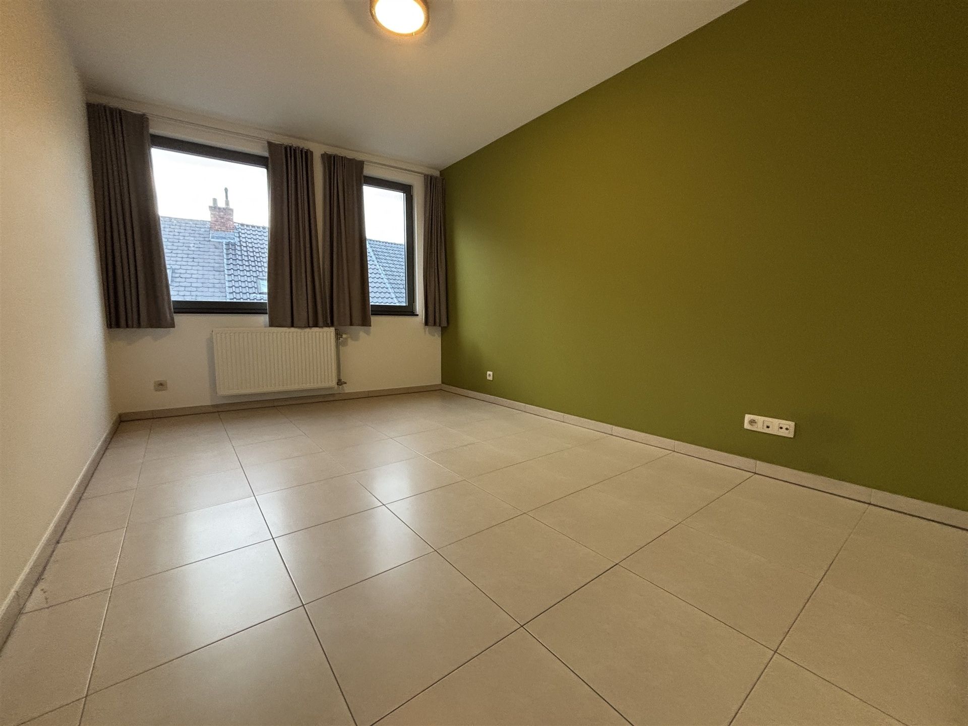 Ruim appartement met 2 slaapkamers in centrum Merchtem  foto 8