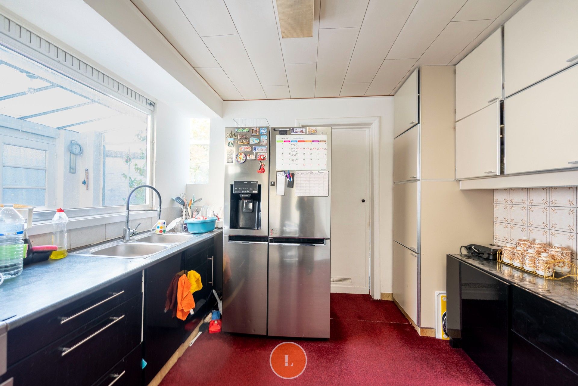 Goed onderhouden woning met 5 slaapkamers, tuin en 2 garages foto 4