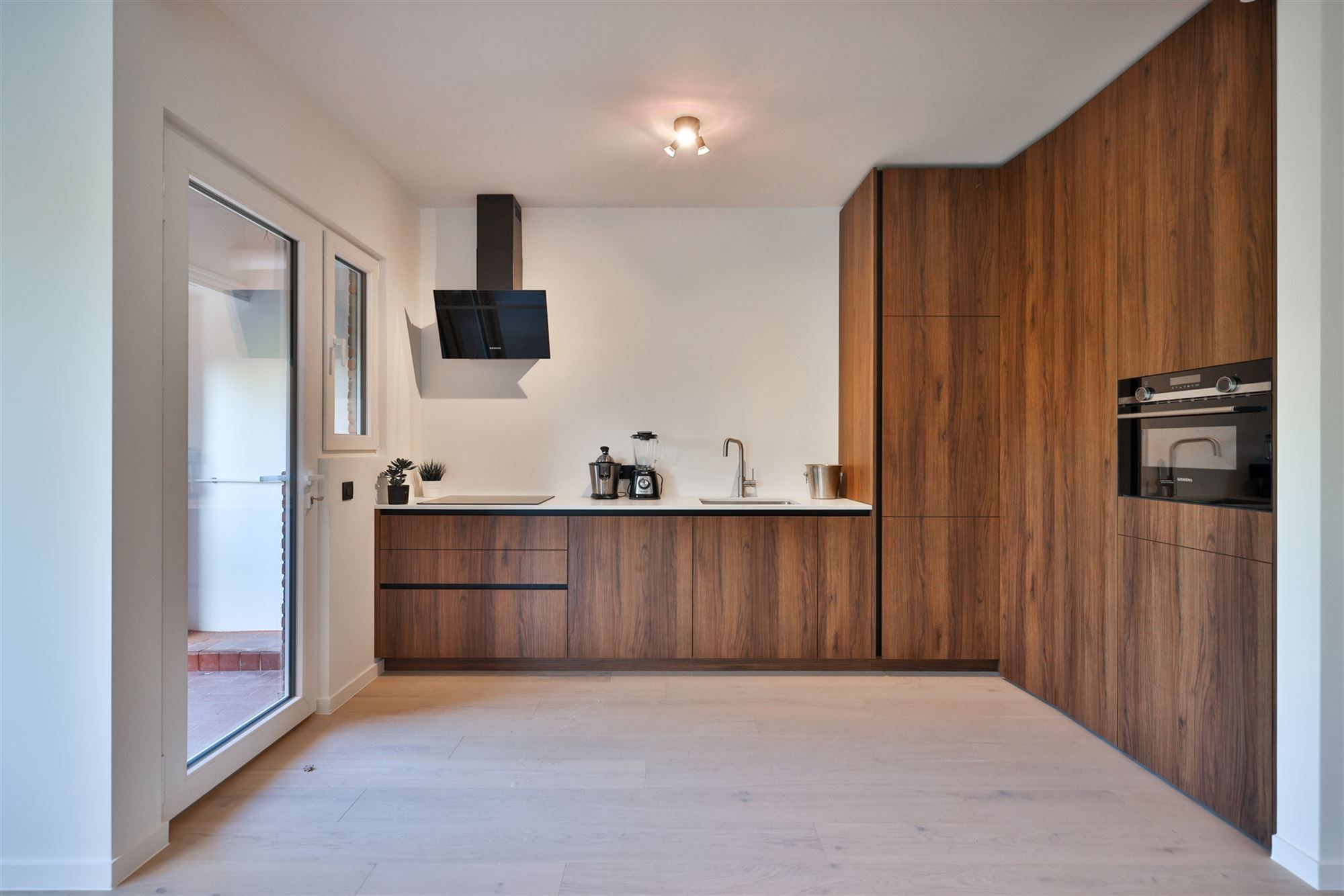 knap vernieuwd 3-slpkamer duplex appartement mét grote tuin foto 4