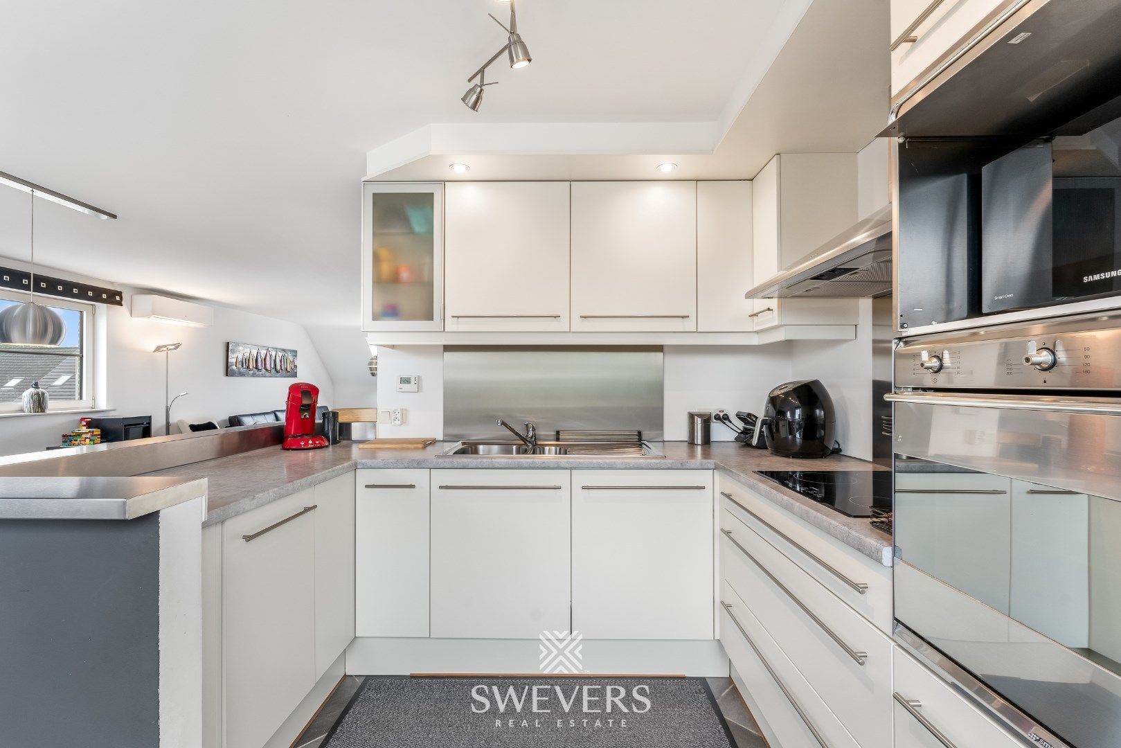 Ruim duplex appartement met 2 slaapkamers en garage foto 18