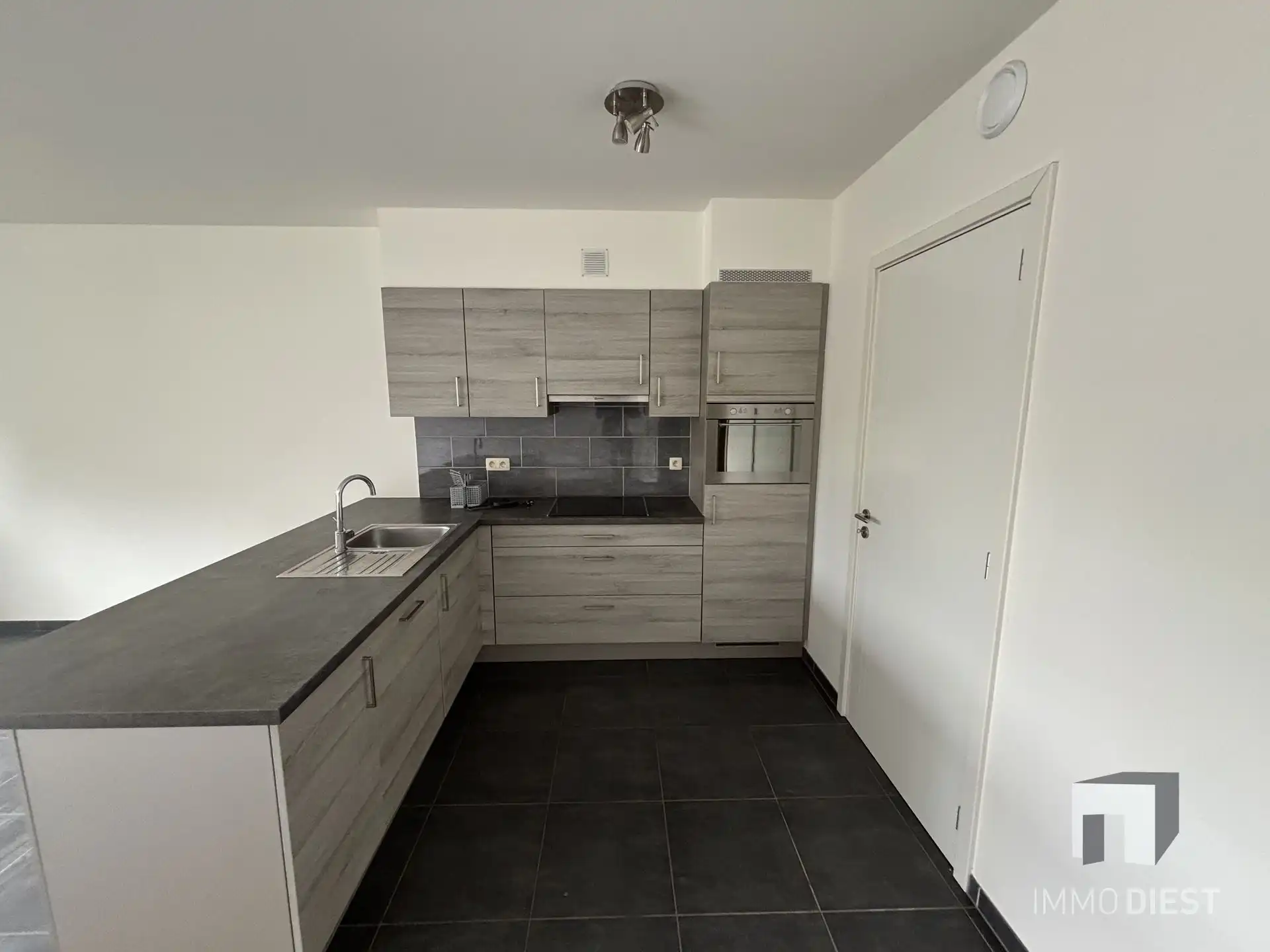 Energiezuinig appartement in centrum met kelder en garagebox foto 49