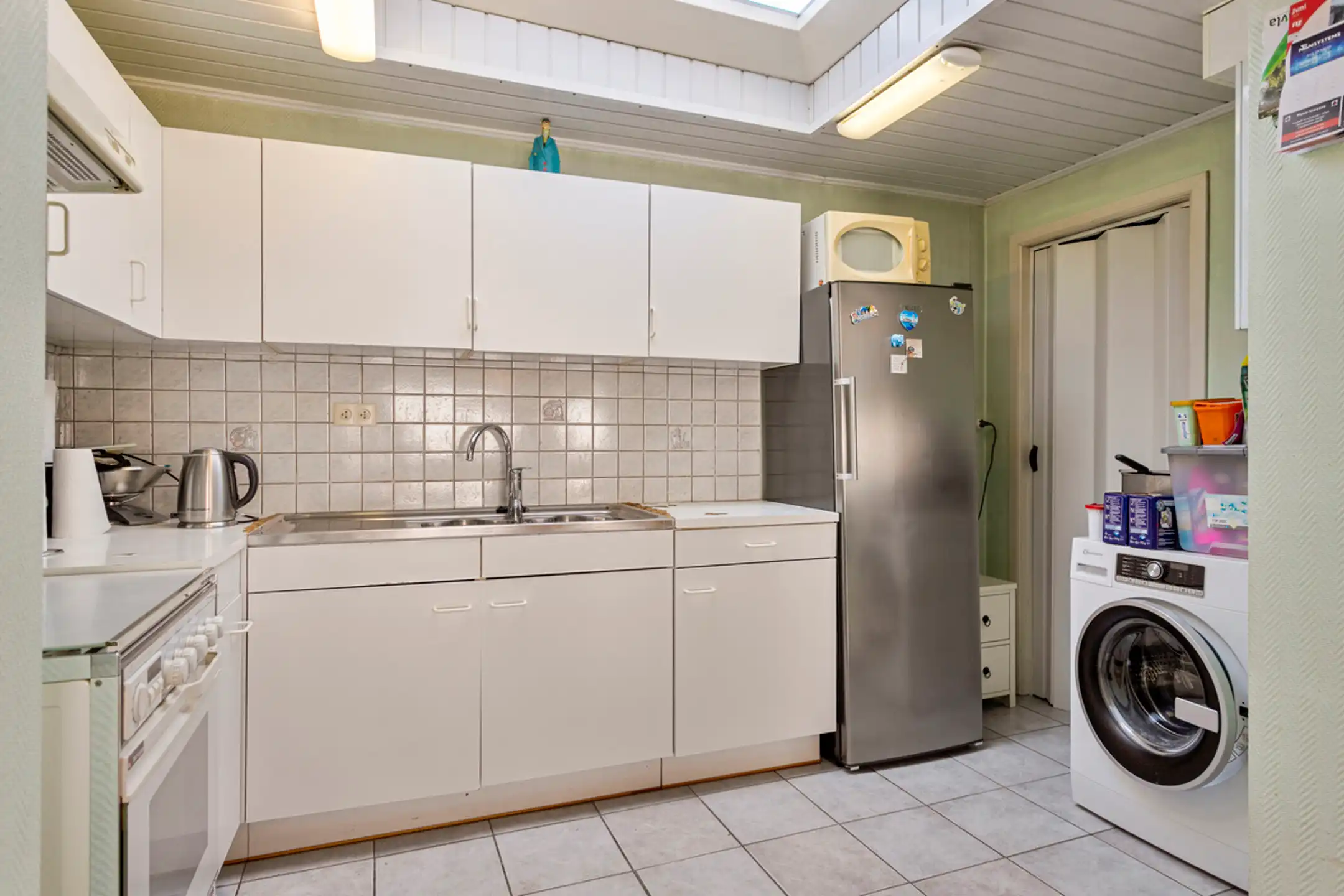 Eigendom met appartement én handelszaak met woonst & garage! foto 20