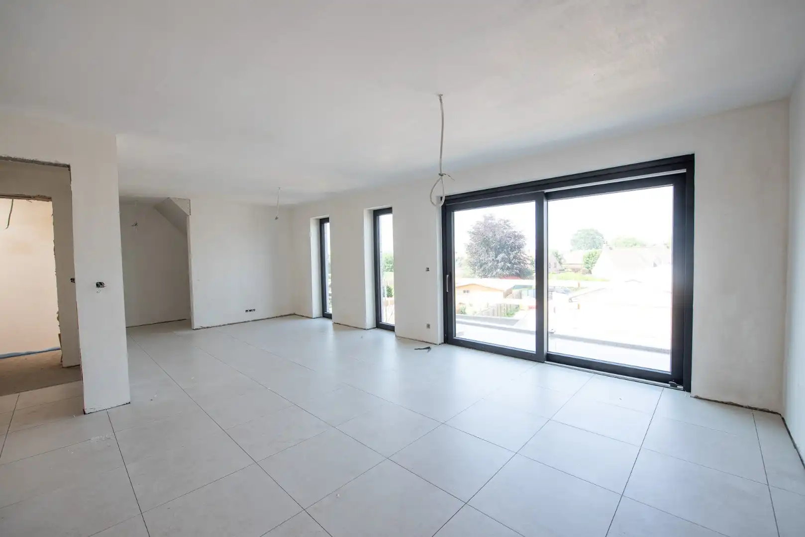 Te koop op 't Gaverke: Moderne benedenwoning met 1 slaapkamer, leuke zuidgeoriënteerde tuin en carport! foto 3