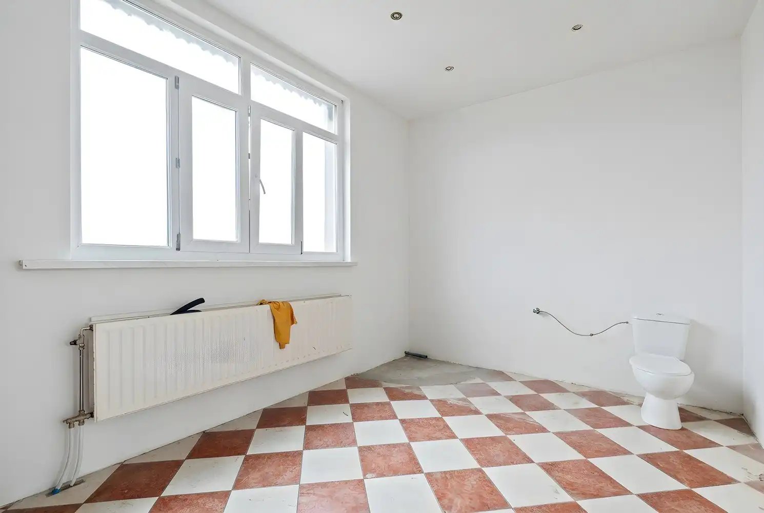 Opbrengsteigendom met een groot magazijn en 3 appartementen te koop! foto 30