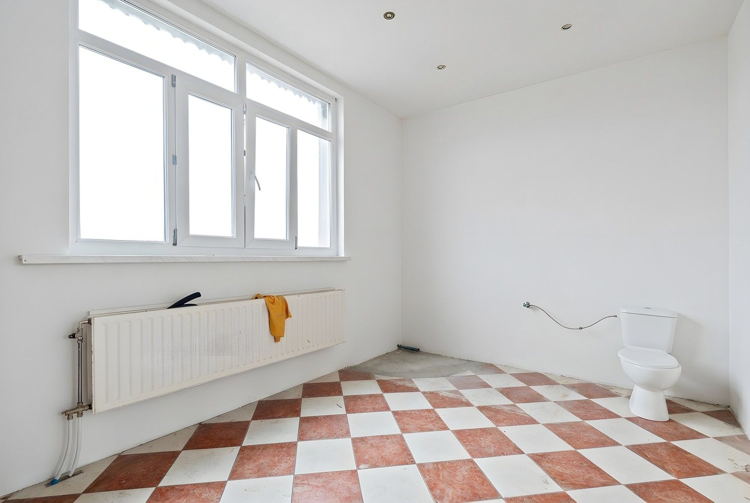 Opbrengsteigendom met een groot magazijn en 3 appartementen te koop! foto 30