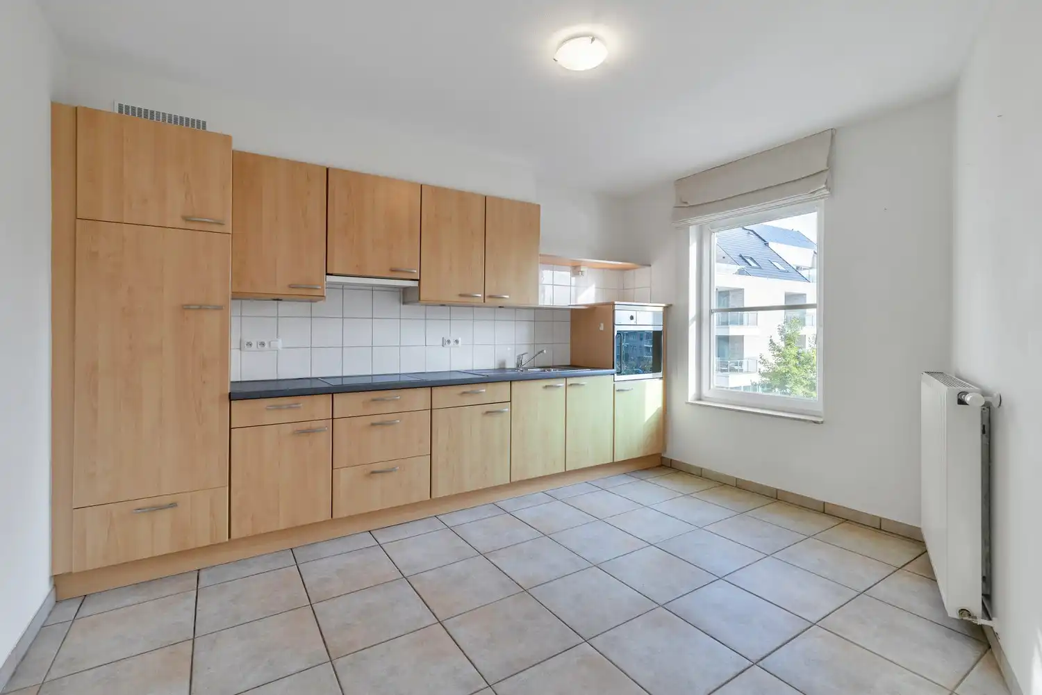 Ruim, licht en zorgeloos wonen in het hart van Lanaken! foto 8