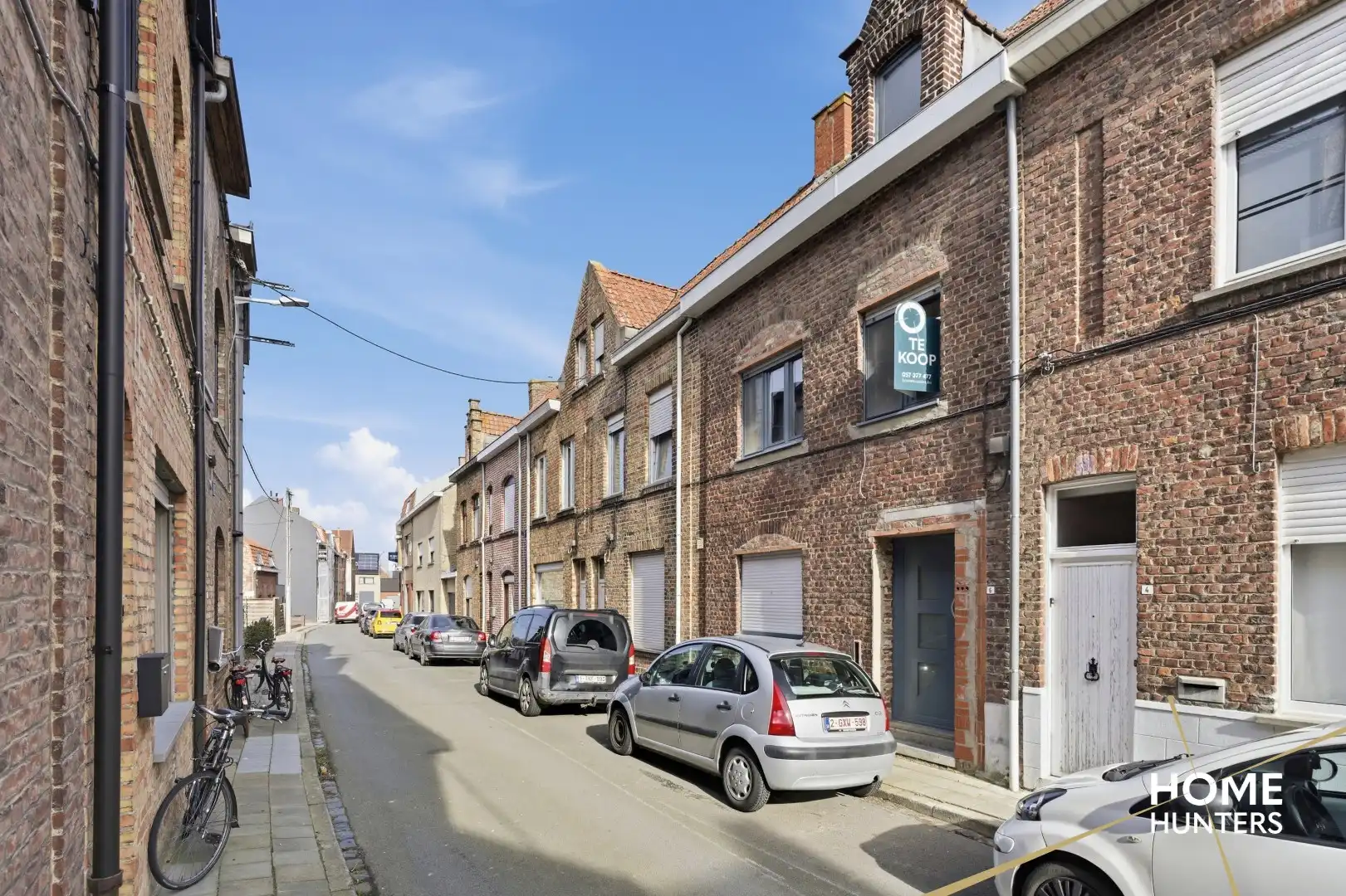 Karaktervolle renovatiekans op topligging in Ieper – 4 slaapkamers, ruime tuin en garage met achteruitgang foto 3