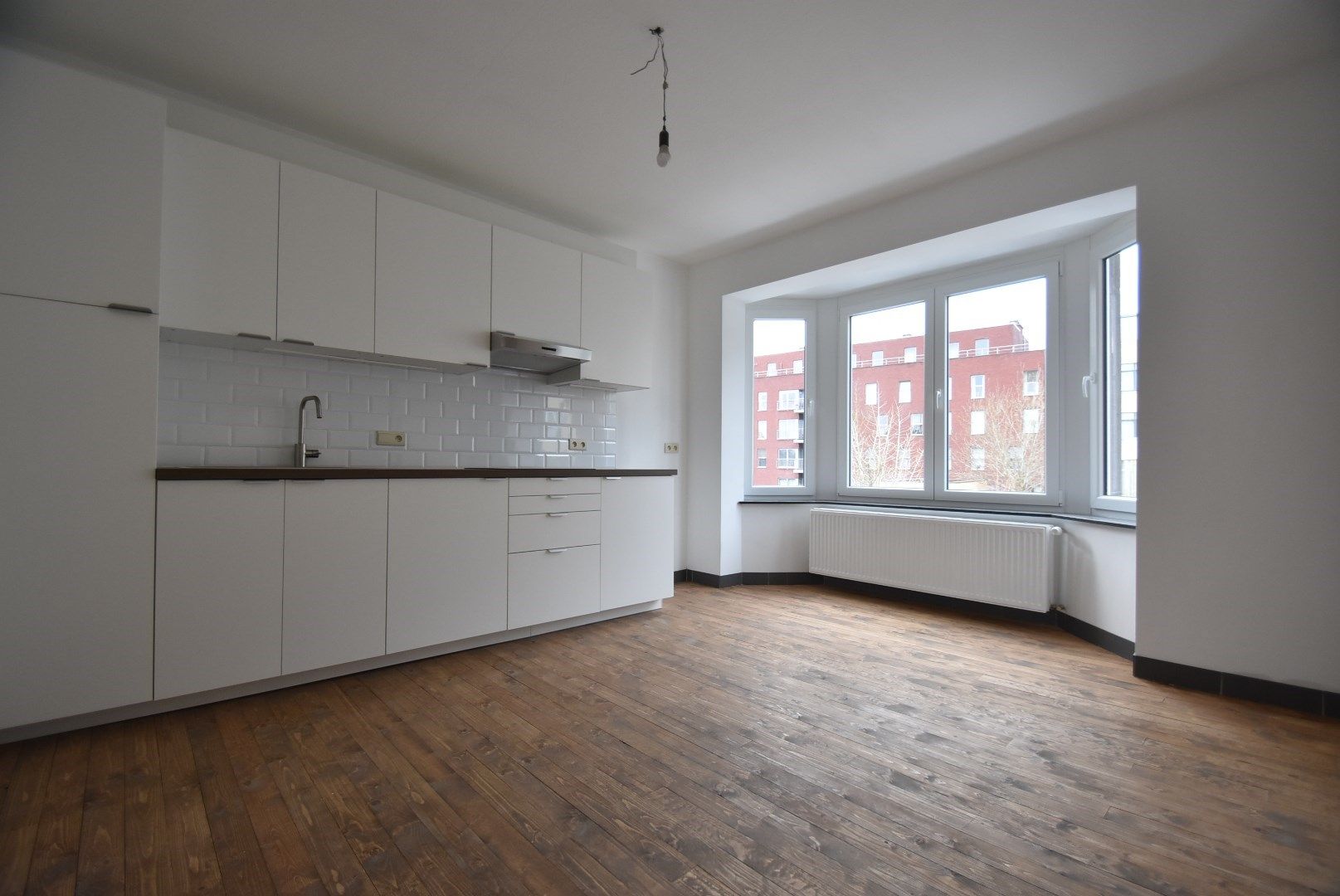 Netjes gerenoveerde duplex met twee slaapkamers en terras op mooie locatie in het centrum van Tongeren - GEEN BIJKOMENDE GEM. ONKOSTEN foto 3