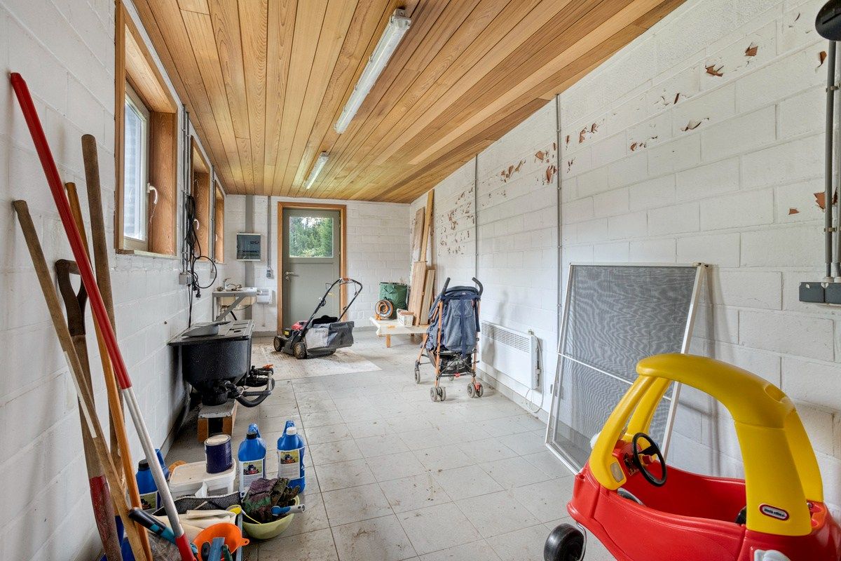 Bijzonder ruime woning met inpandige garage en 3 slks op een perceel van 1218 m². foto 15