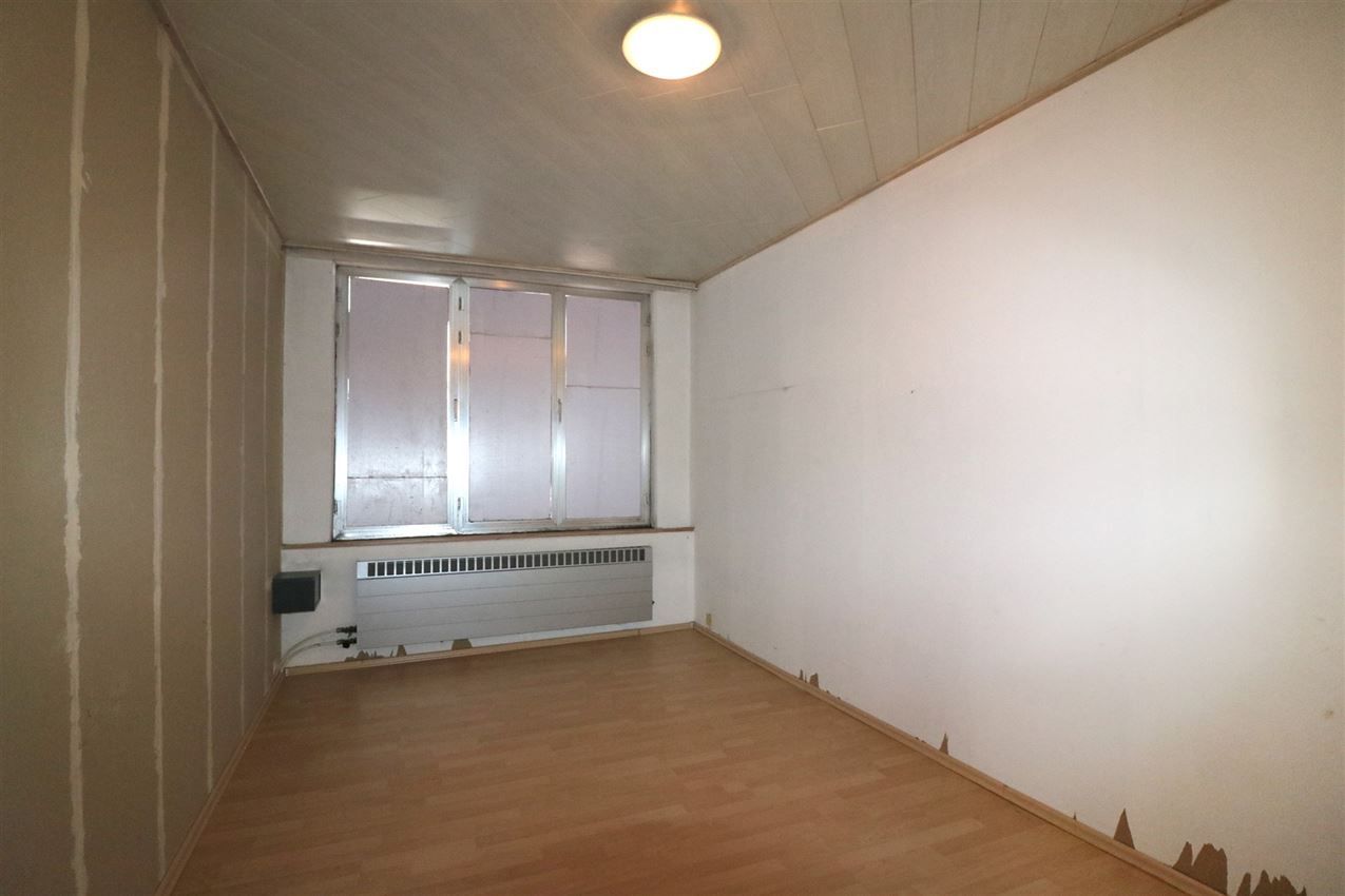 Ideale starterswoning (2 slpk) met garage foto 19