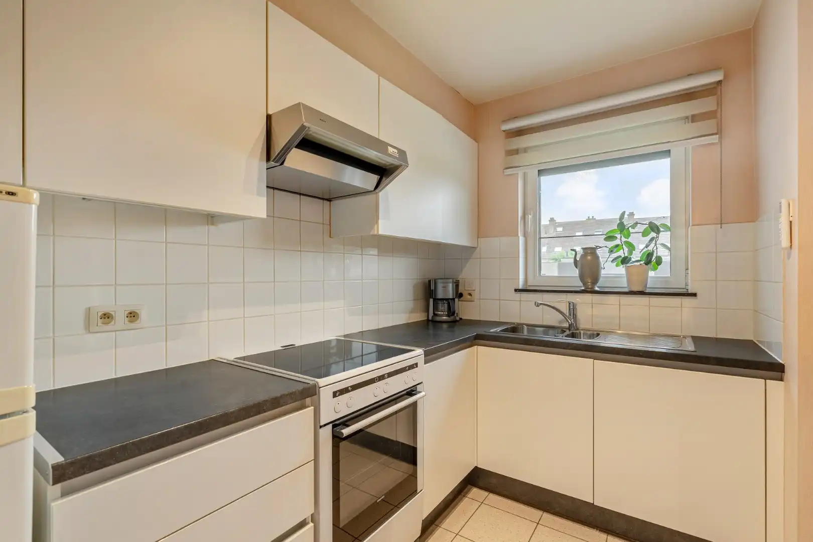 Comfortabel appartement met 1 slaapkamer, terras en autostandplaats nabij het centrum van Maaseik! foto 12