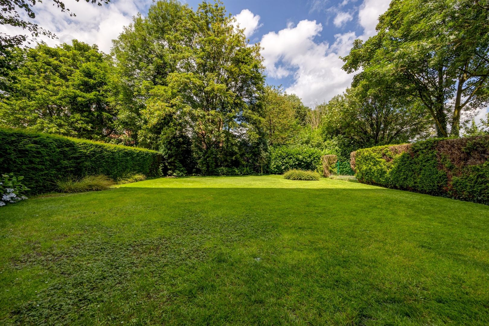 Uniek gelijkvloers appartement met grote tuin en privé ingang foto 3