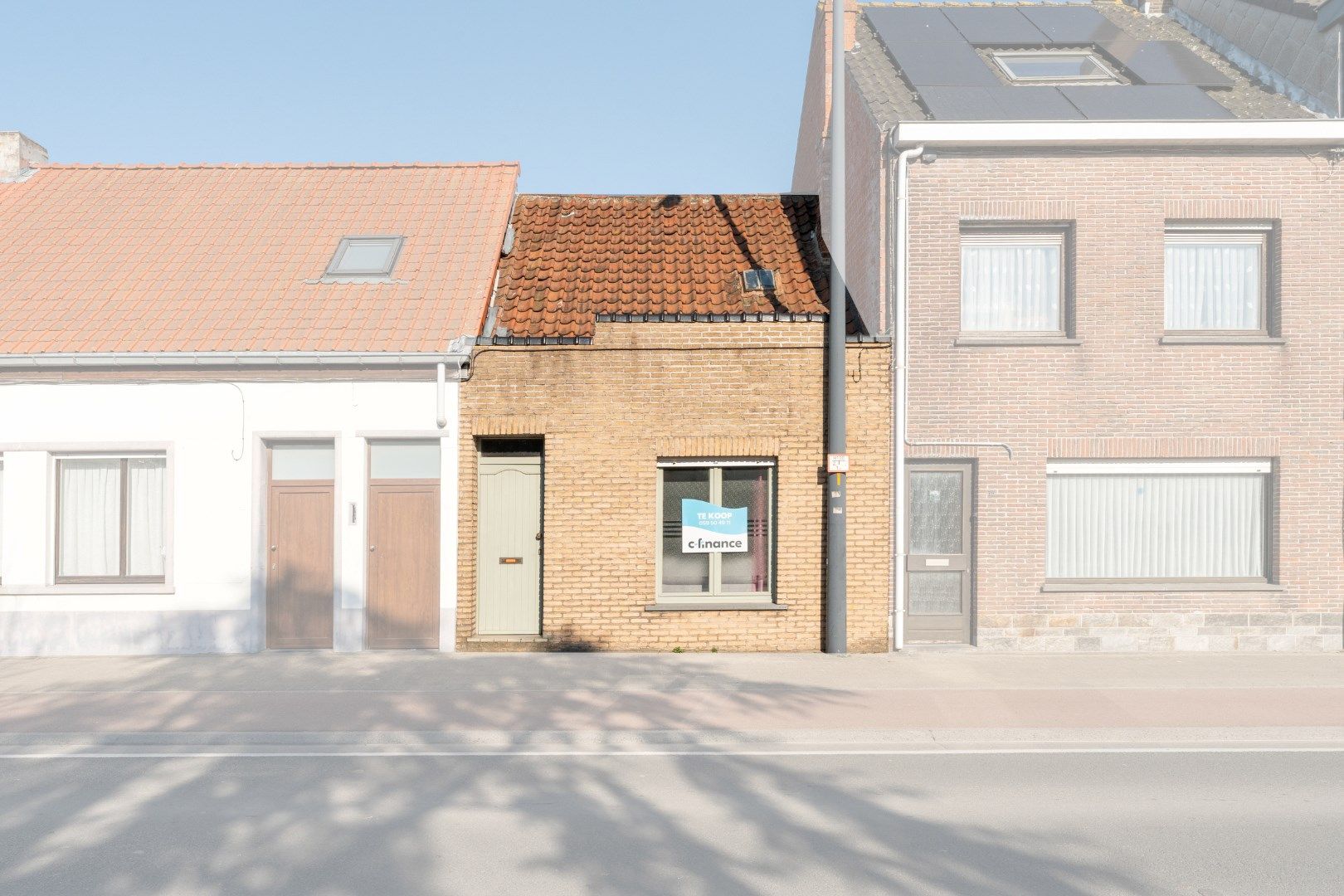 Volledig te renoveren stadswoning met zonnige tuin en tal van mogelijkheden op strategische ligging! foto 6