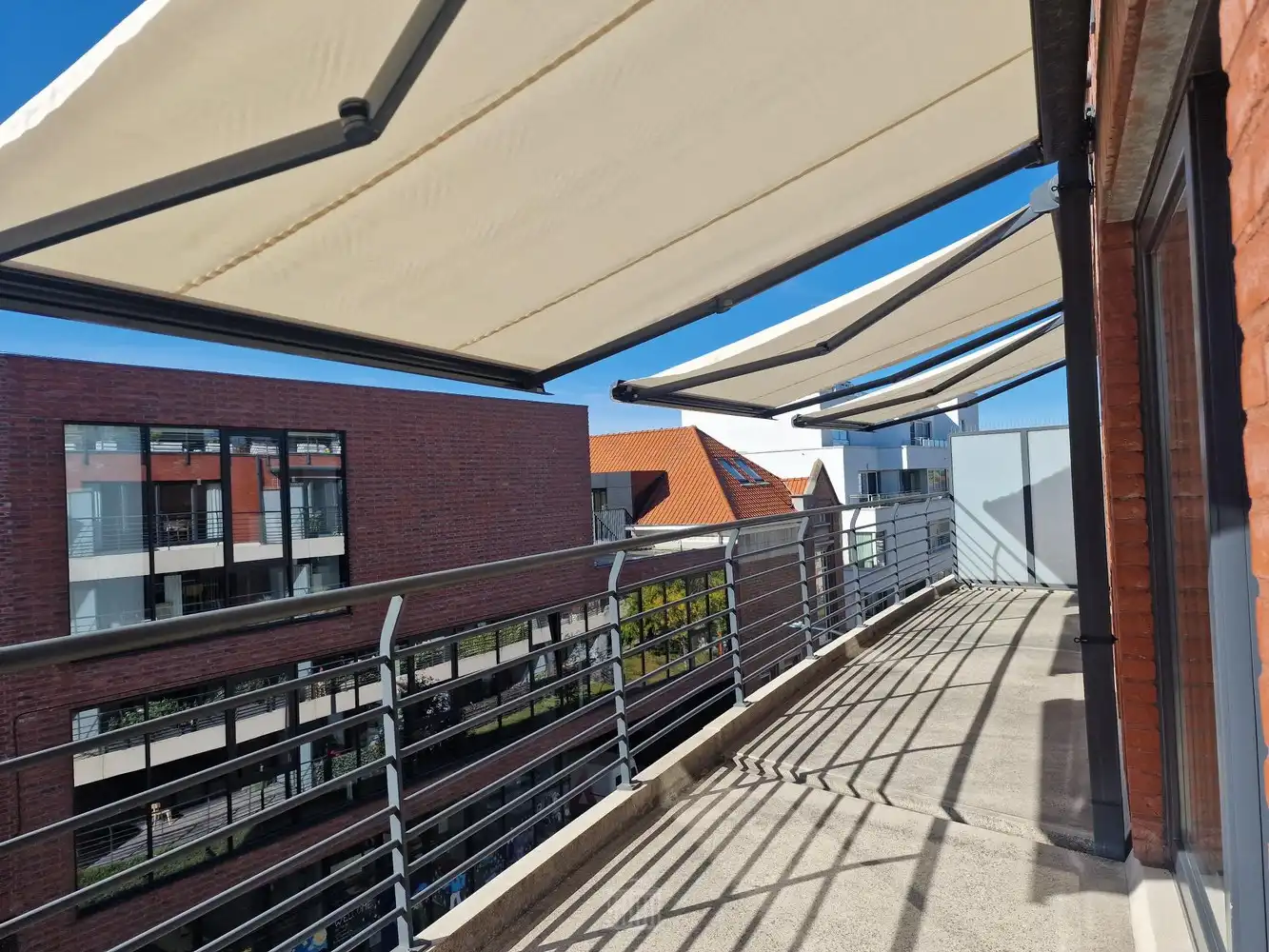 Ruim (126m²) en lichtrijk appartement met 3 slaapkamers, 2 terrassen in het stadscentrum! foto 14