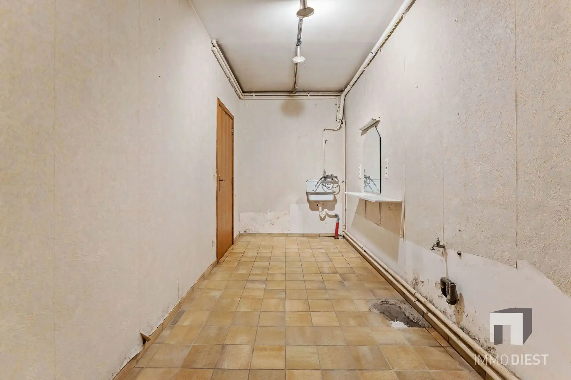 Ruime stadswoning met 4 slaapkamers in centrum Halen  foto 16