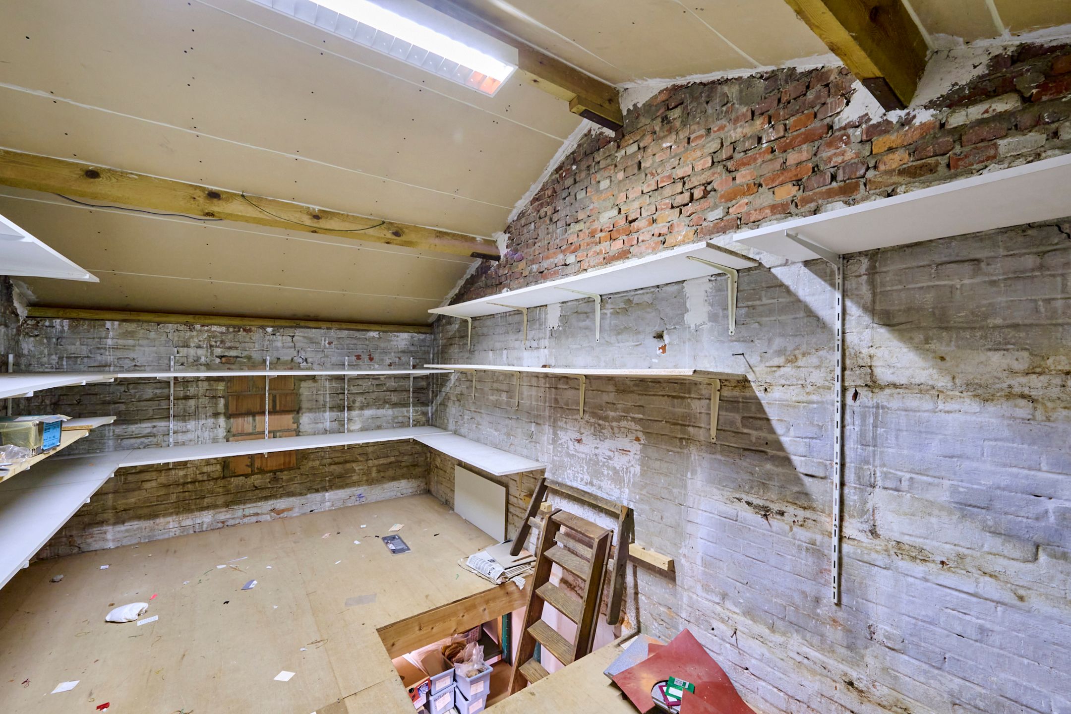 Ruim handelspand met bovenliggend appartement foto 11