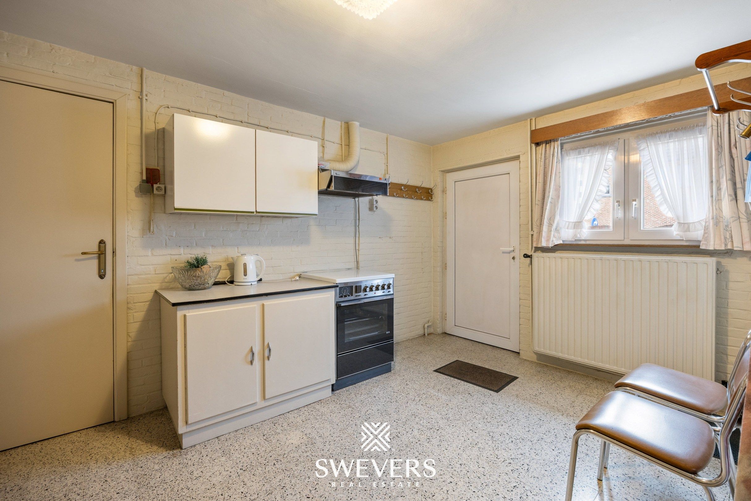 Te renoveren ruime gezinswoning met vijf slaapkamers en uitbreidingsmogelijkheden foto 11