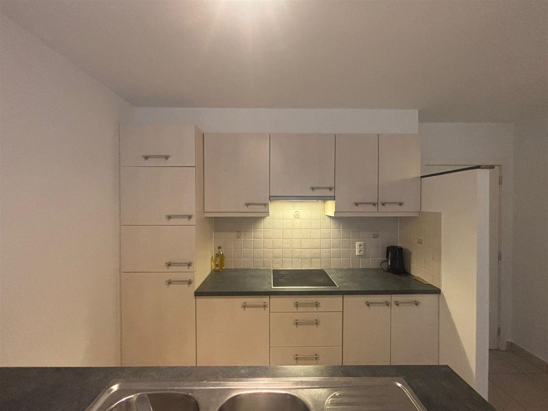 Duplex-appartement met extra zolderkamer + garagebox in het centrum! foto 7