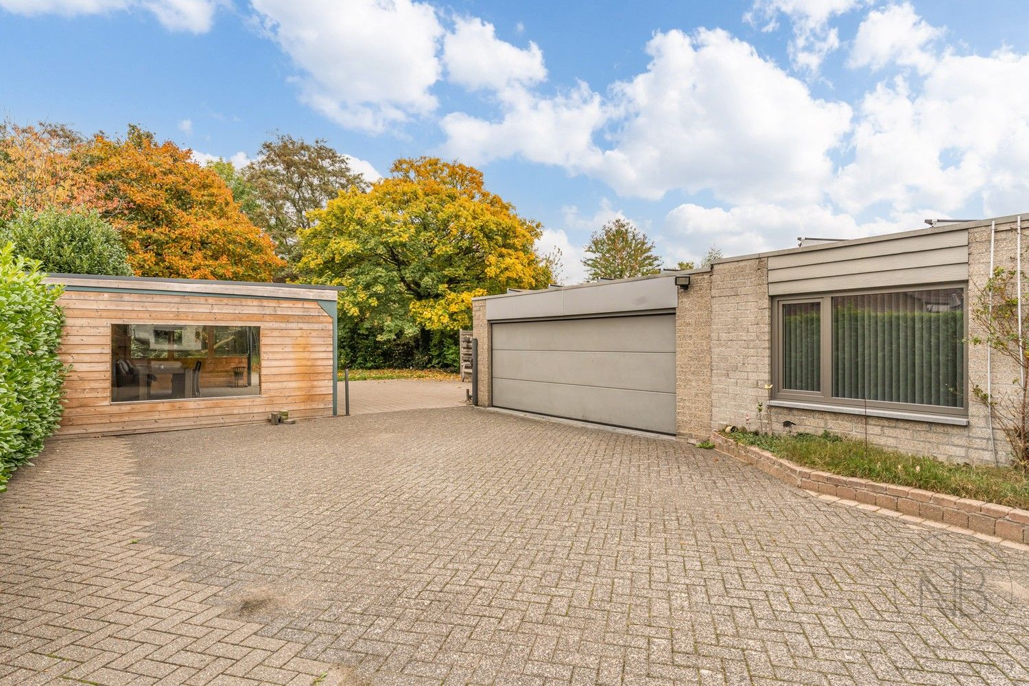 Pand met vergunde praktijkruimte, woonst, garage en carport in Opglabbeek foto 36