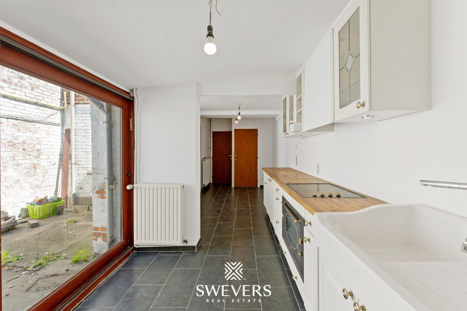 Instapklare woning met 4 slpks en tuin in Borgloon foto 10