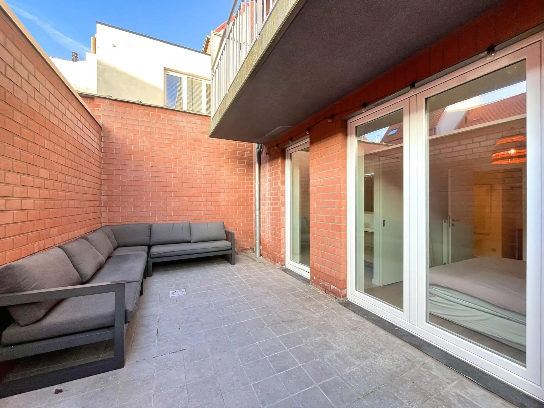 Knap gelijkvloers appartement te Heist-centrum foto 11