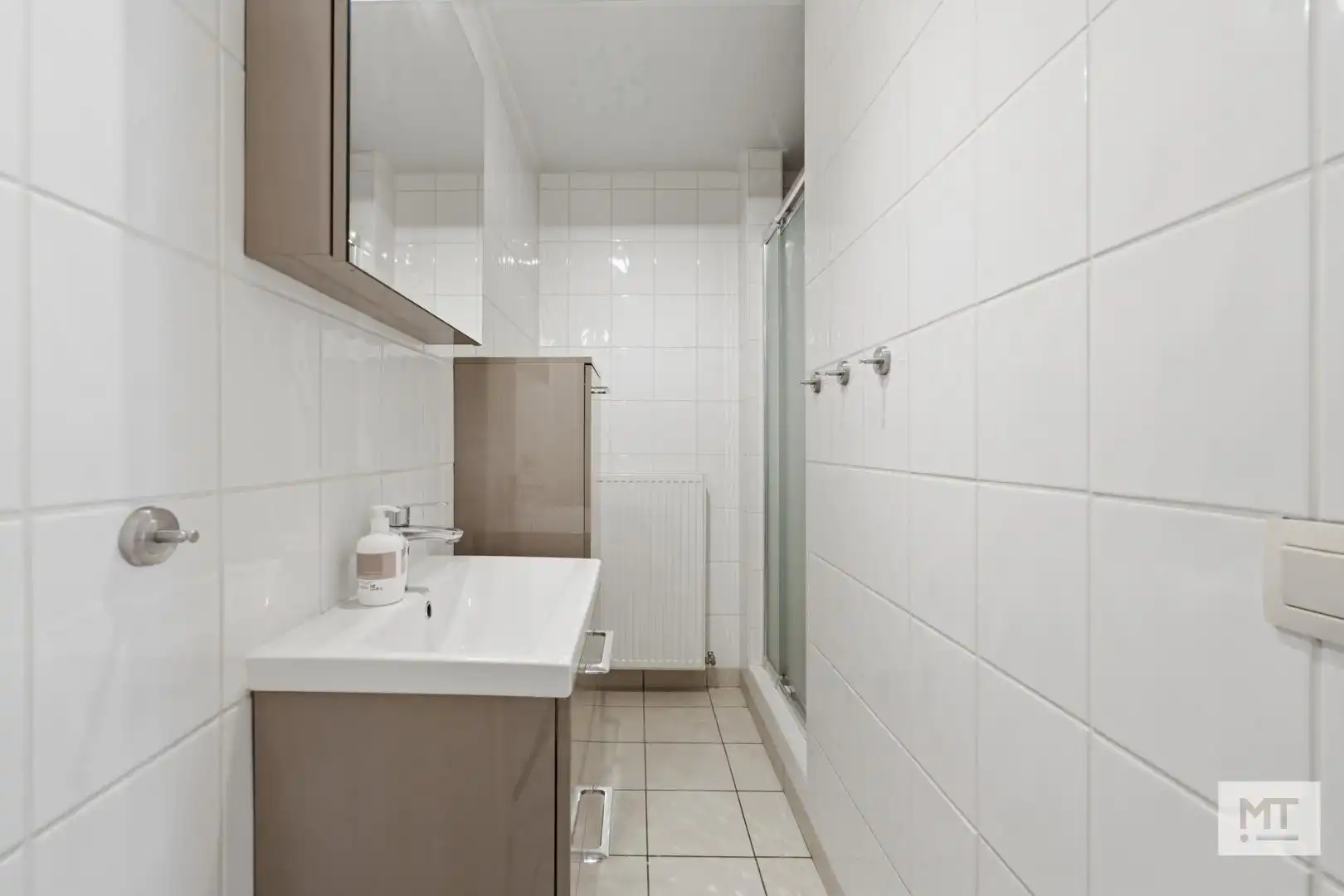 Gelijkvloers twee-slaapkamerappartement met garage te koop in het centrum van Langemark foto 13