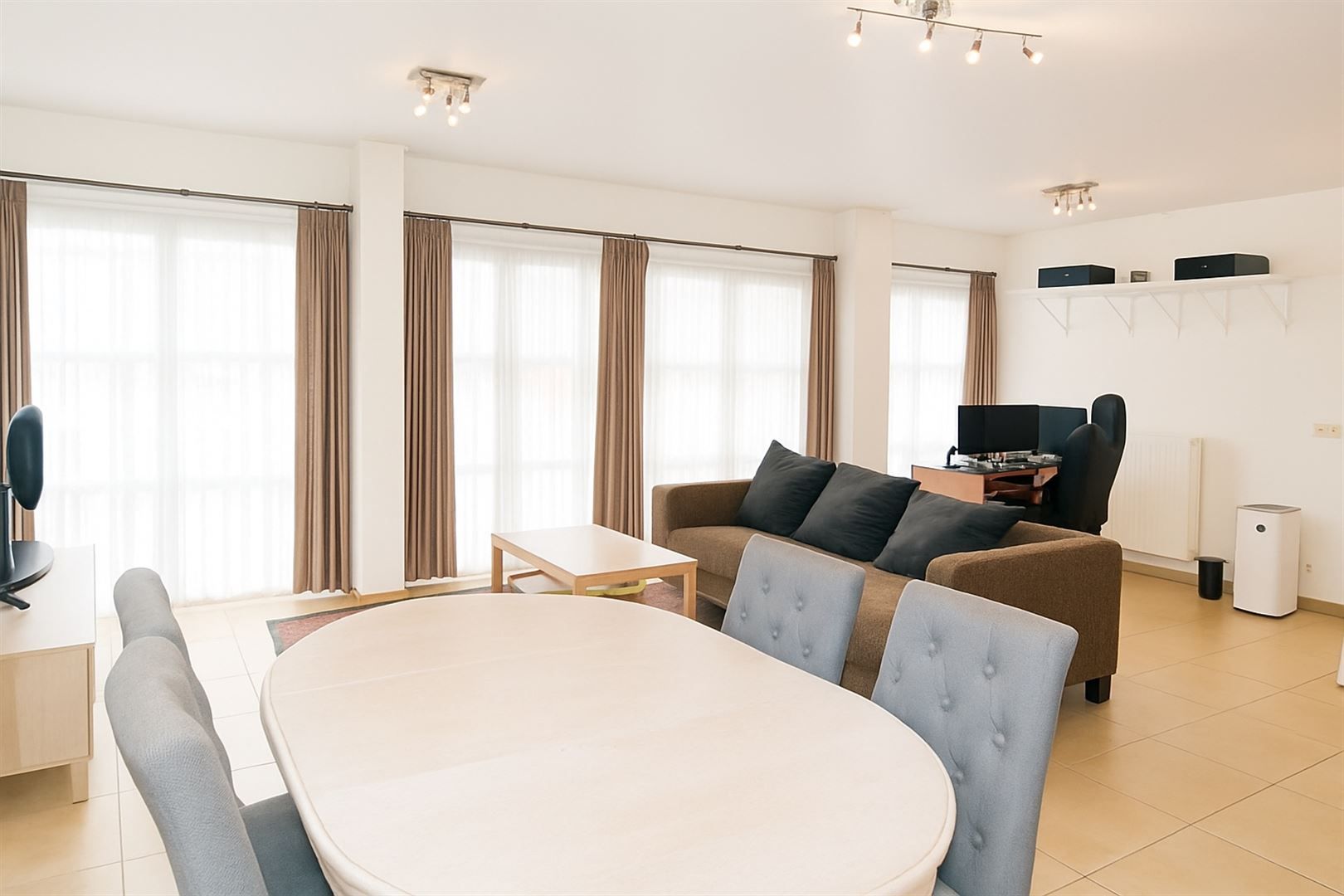 Modern gelijkvloersappartement + tuin & garage op toplocatie foto 2