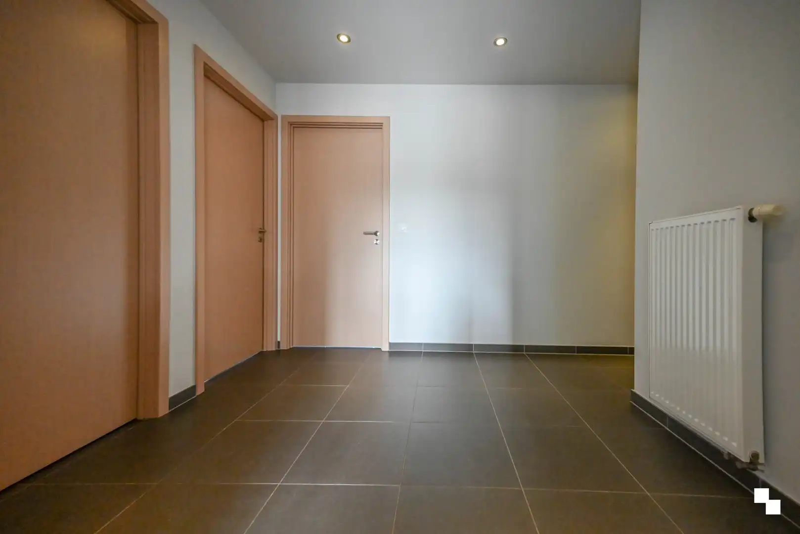 Ruim appartement met drie slaapkamers & garagebox foto 13