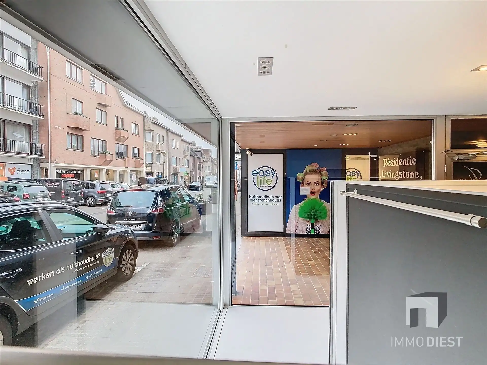 Handelsgelijkvloers met achterliggend appartement foto 9